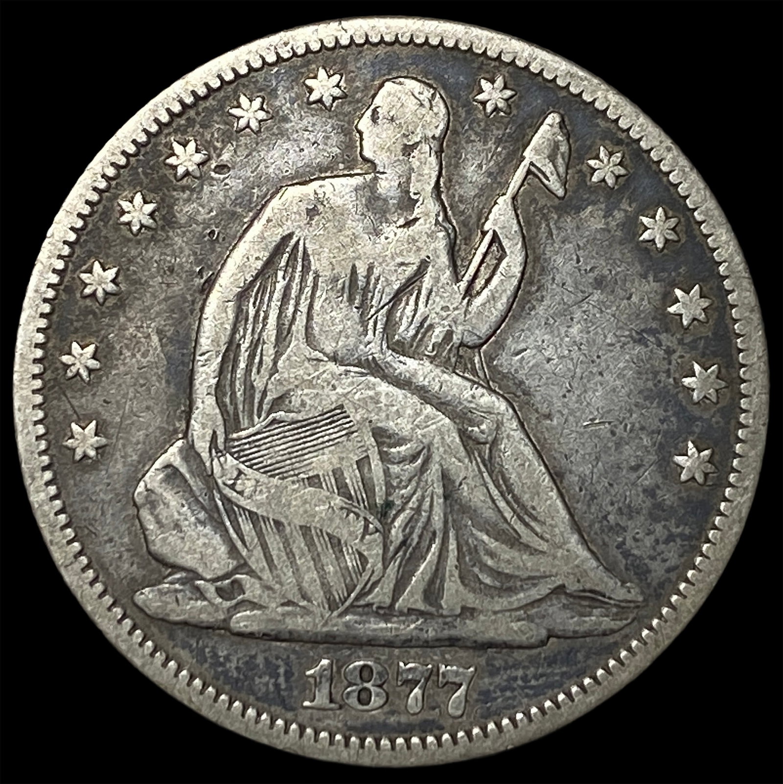 1877 Seated Liberty Half Dollar UNCIRCULATED (1 of 2)