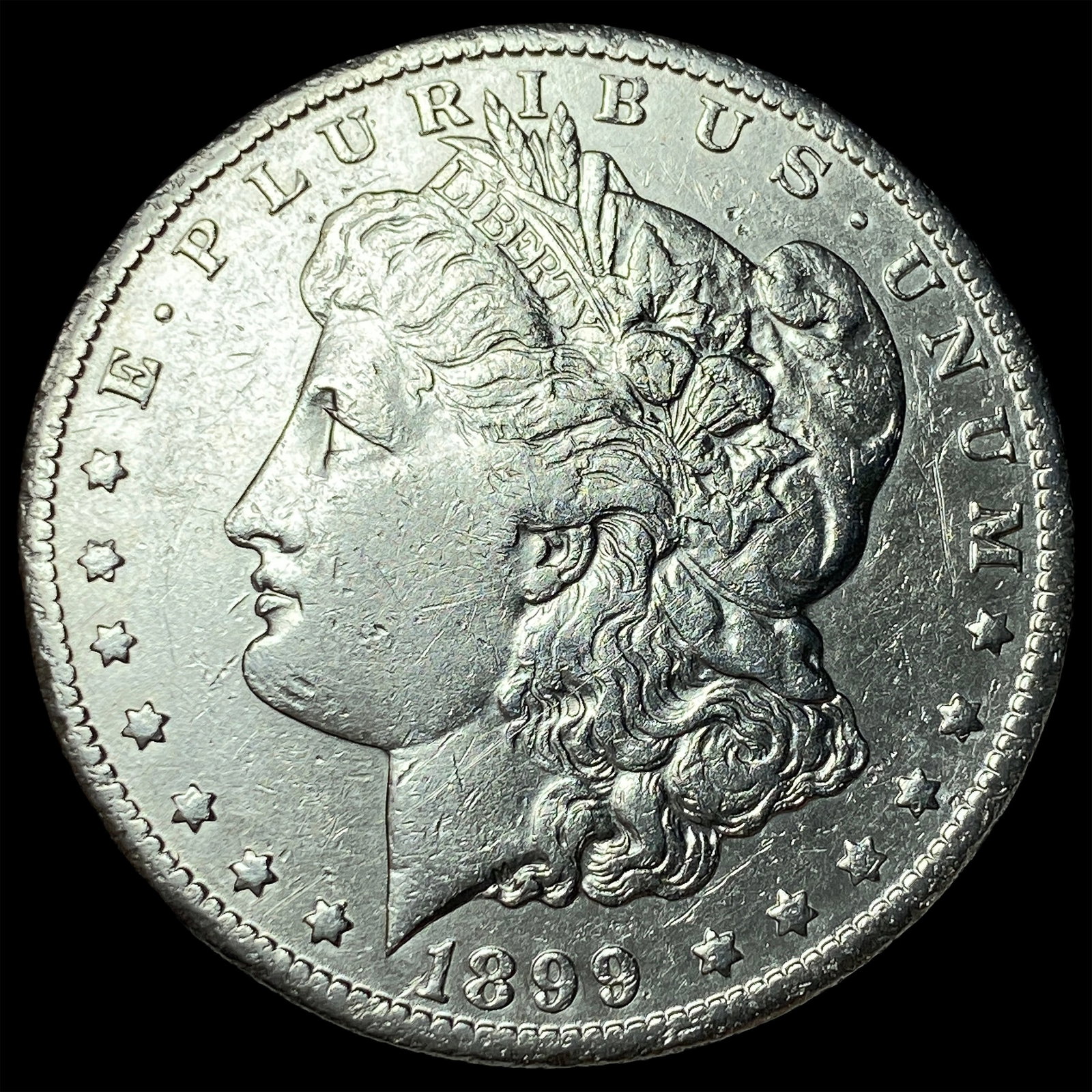 1899-O Micro O Silver Morgan Dollar NEARLY UNCIRCULATED (1 of 2)