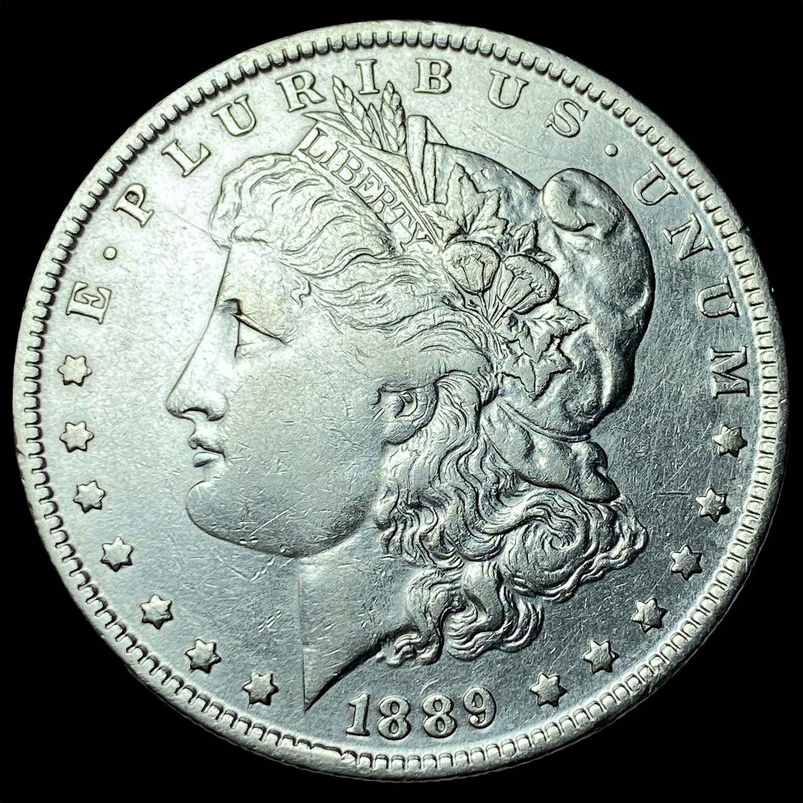 1889-O Silver Morgan Dollar NEARLY UNCIRCULATED (1 of 2)