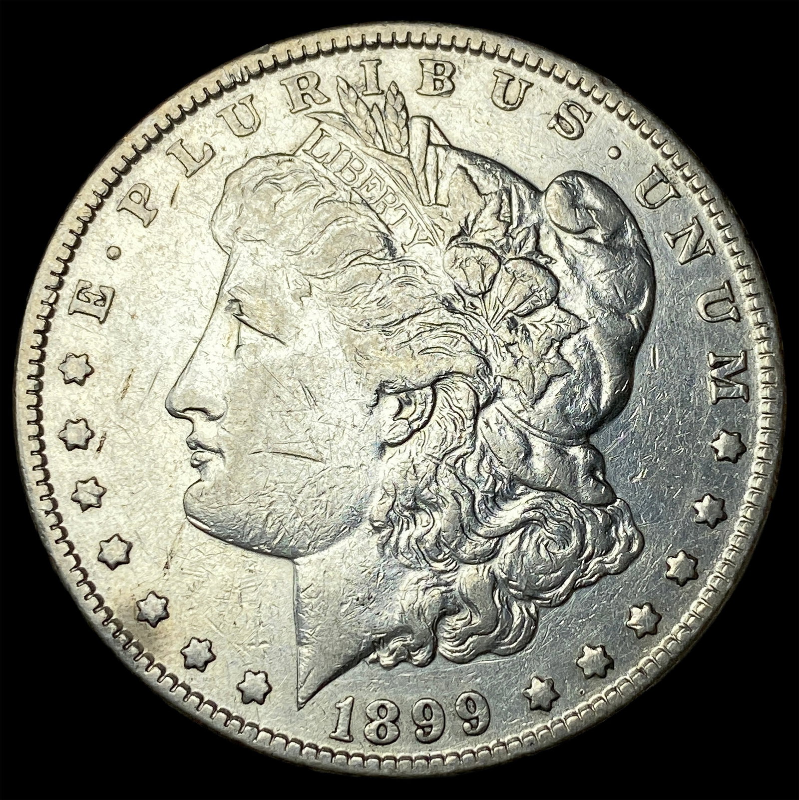1899 Morgan Silver Dollar NEARLY UNCIRCULATED (1 of 2)