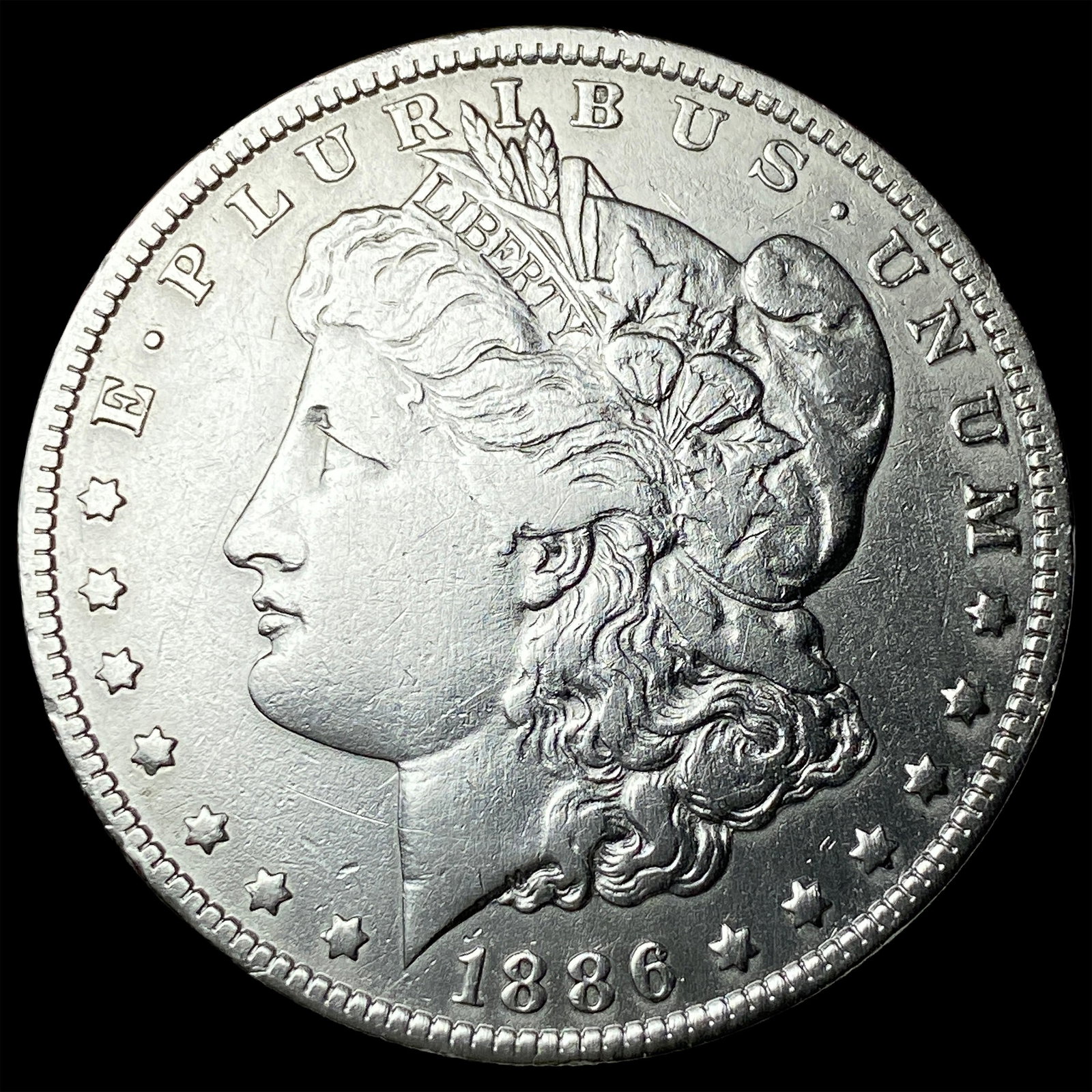 1886-O Silver Morgan Dollar CLOSELY UNCIRCULATED: 1886-O Silver Morgan Dollar CLOSELY UNCIRCULATED