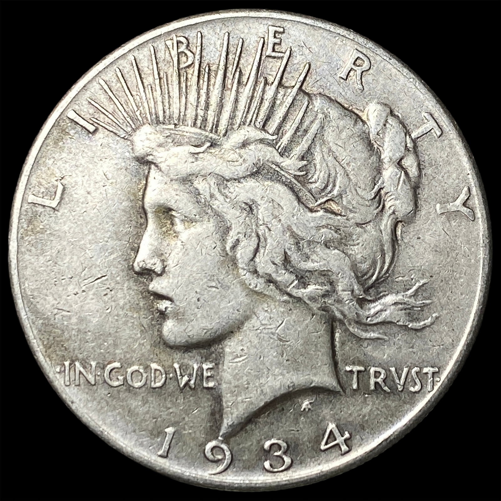 1934 Silver Peace Dollar CLOSELY UNCIRCULATED (1 of 2)