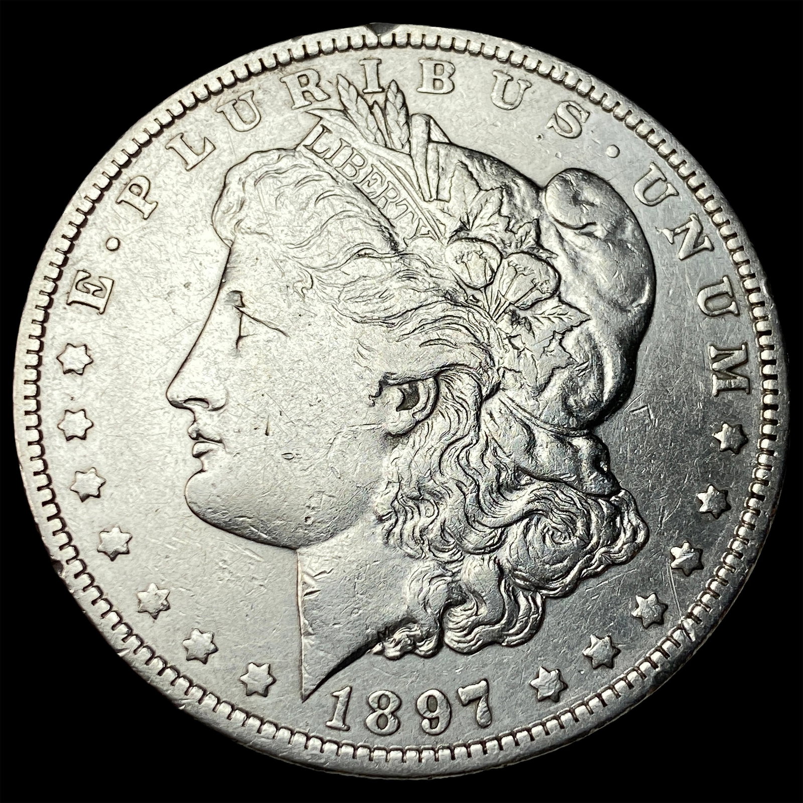 1897-O Silver Morgan Dollar NEARLY UNCIRCULATED (1 of 2)