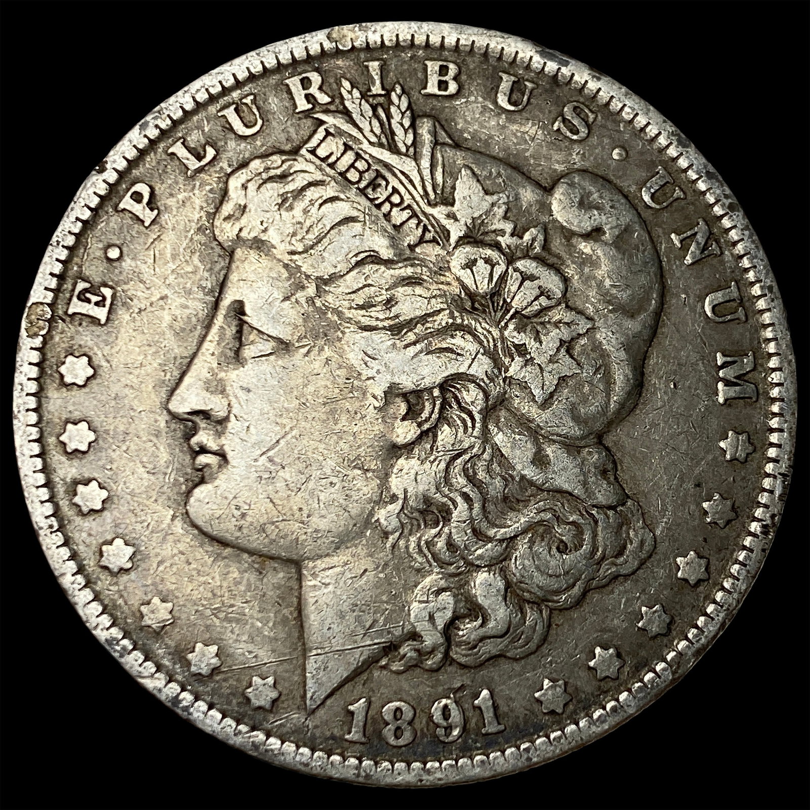 1891-O Silver Morgan Dollar CLOSELY UNCIRCULATED (1 of 2)