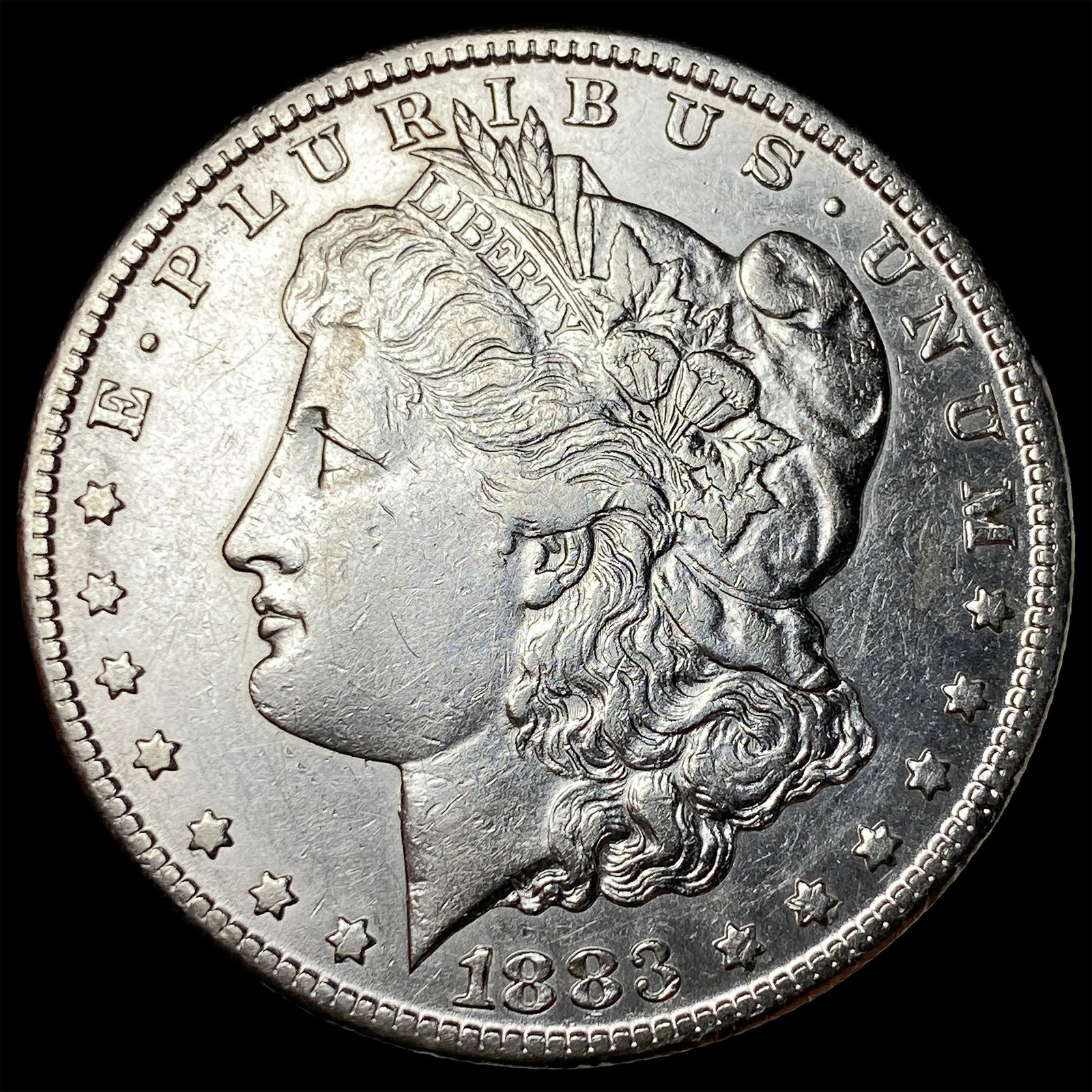 1883-CC Silver Morgan Dollar CLOSELY UNCIRCULATED (1 of 2)