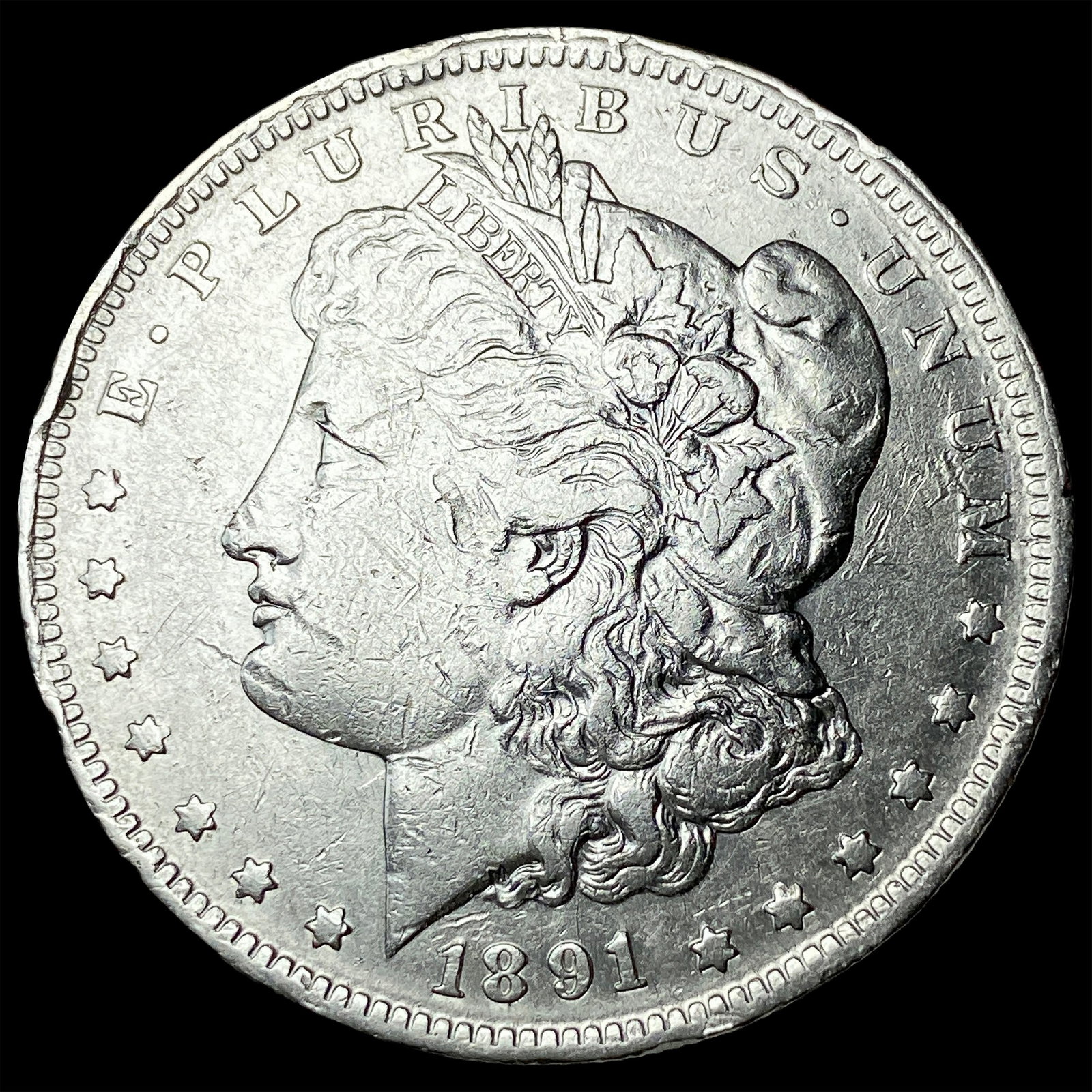 1891-O Silver Morgan Dollar NEARLY UNCIRCULATED (1 of 2)