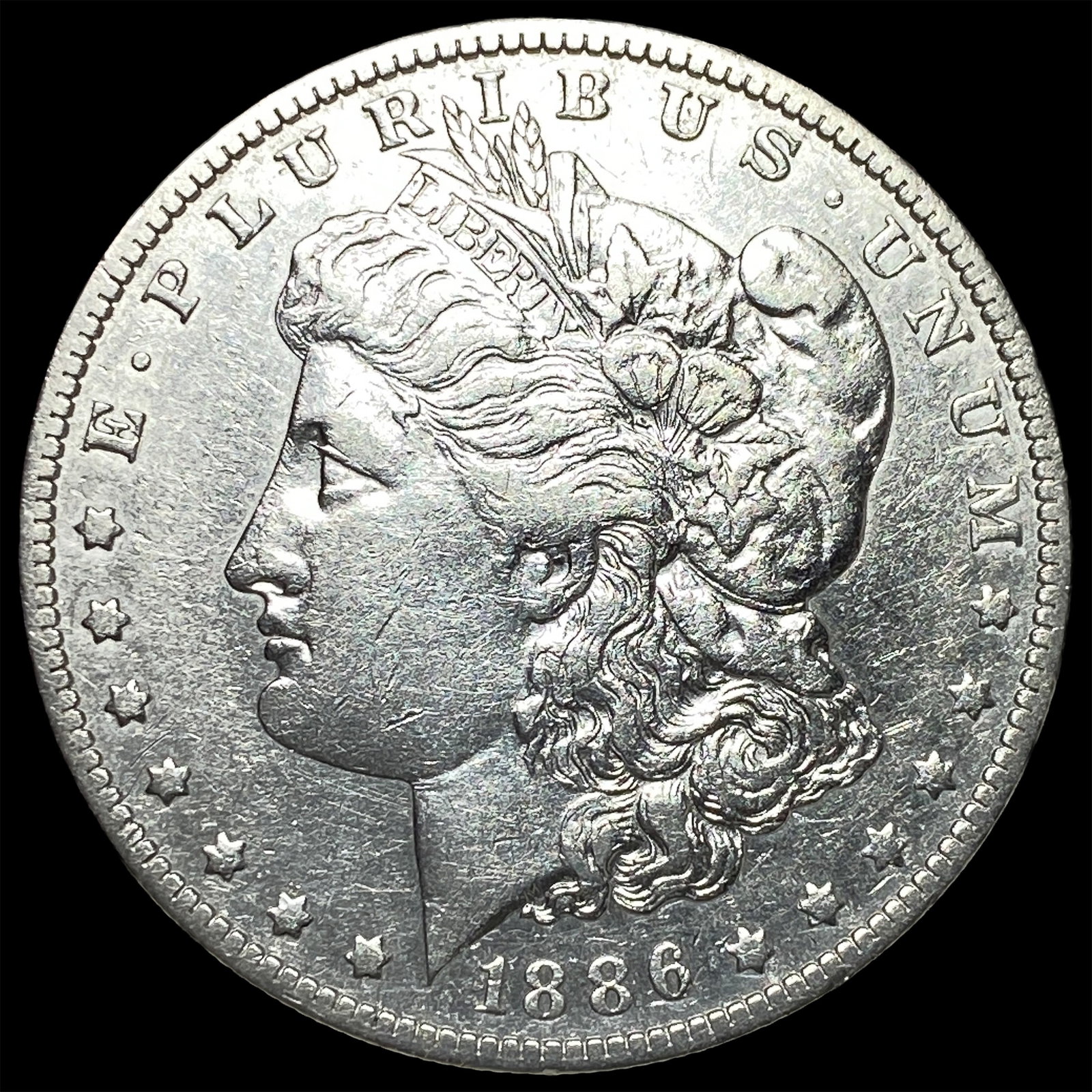 1886-O Silver Morgan Dollar CLOSELY UNCIRCULATED: 1886-O Silver Morgan Dollar CLOSELY UNCIRCULATED