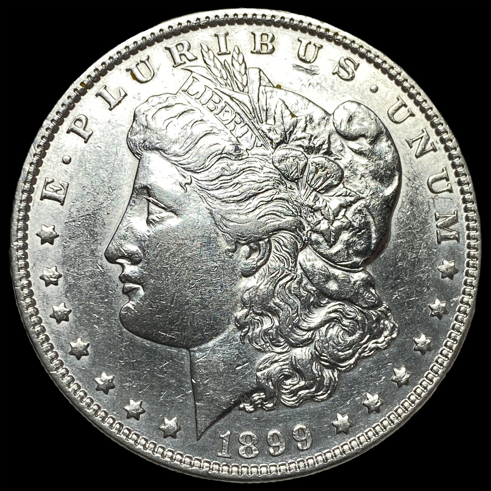1899 Morgan Silver Dollar CLOSELY UNCIRCULATED: 1899 Morgan Silver Dollar CLOSELY UNCIRCULATED