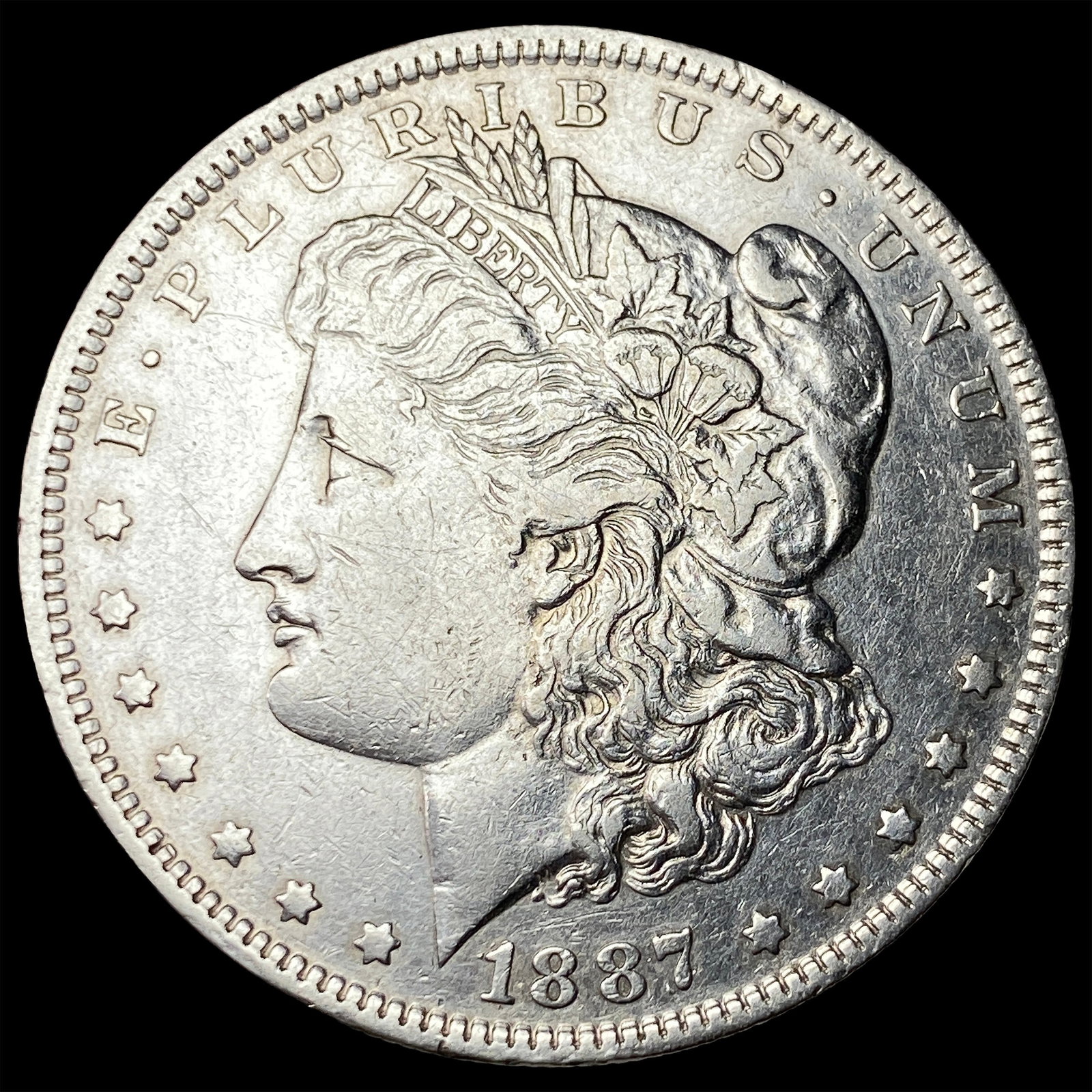 1887-O Silver Morgan Dollar CLOSELY UNCIRCULATED: 1887-O Silver Morgan Dollar CLOSELY UNCIRCULATED