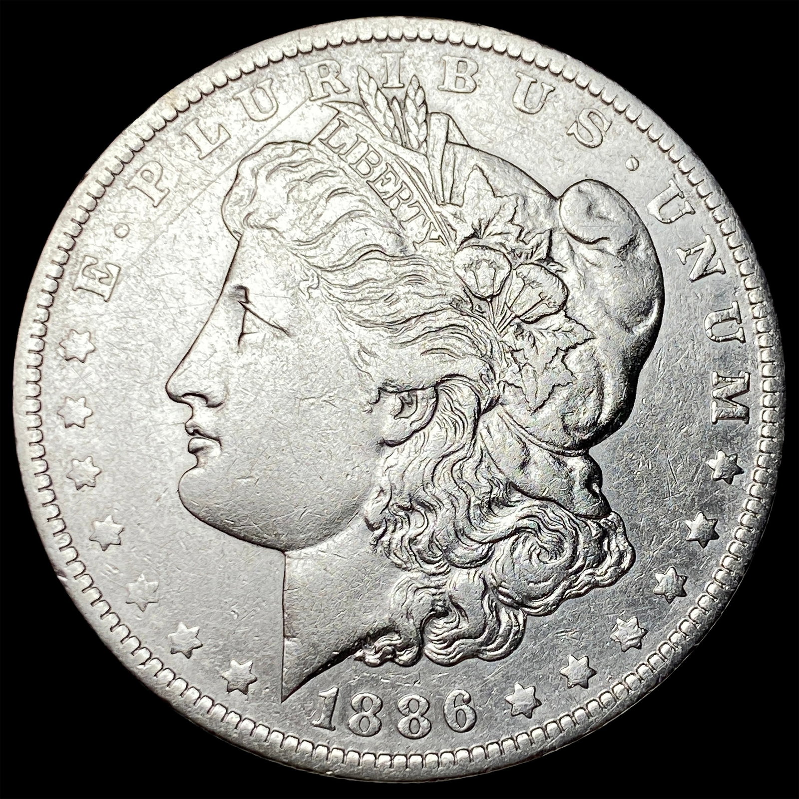 1886-O Morgan Silver Dollar CLOSELY UNCIRCULATED: 1886-O Morgan Silver Dollar CLOSELY UNCIRCULATED