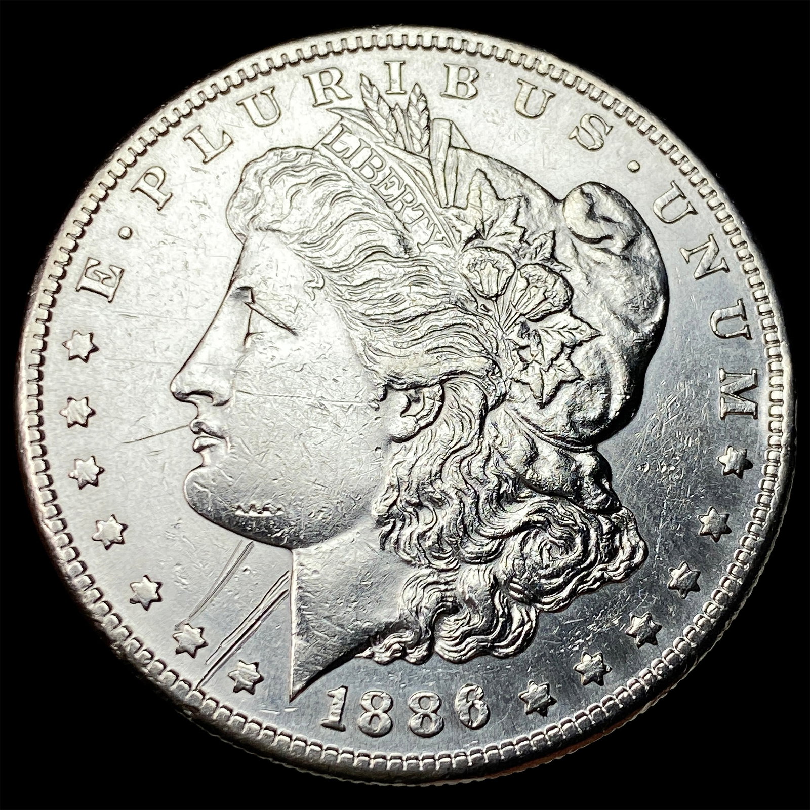 1886-S Silver Morgan Dollar ABOUT UNCIRCULATED: 1886-S Silver Morgan Dollar ABOUT UNCIRCULATED