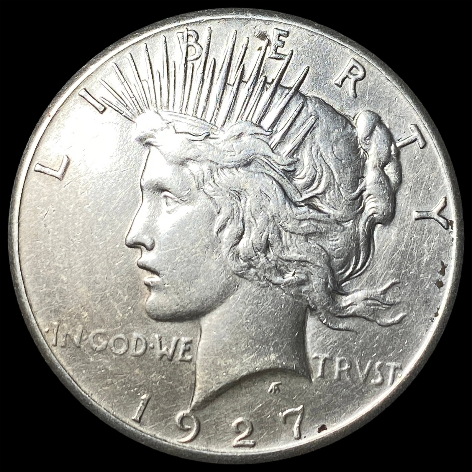 1927 Silver Peace Dollar NEARLY UNCIRCULATED (1 of 2)