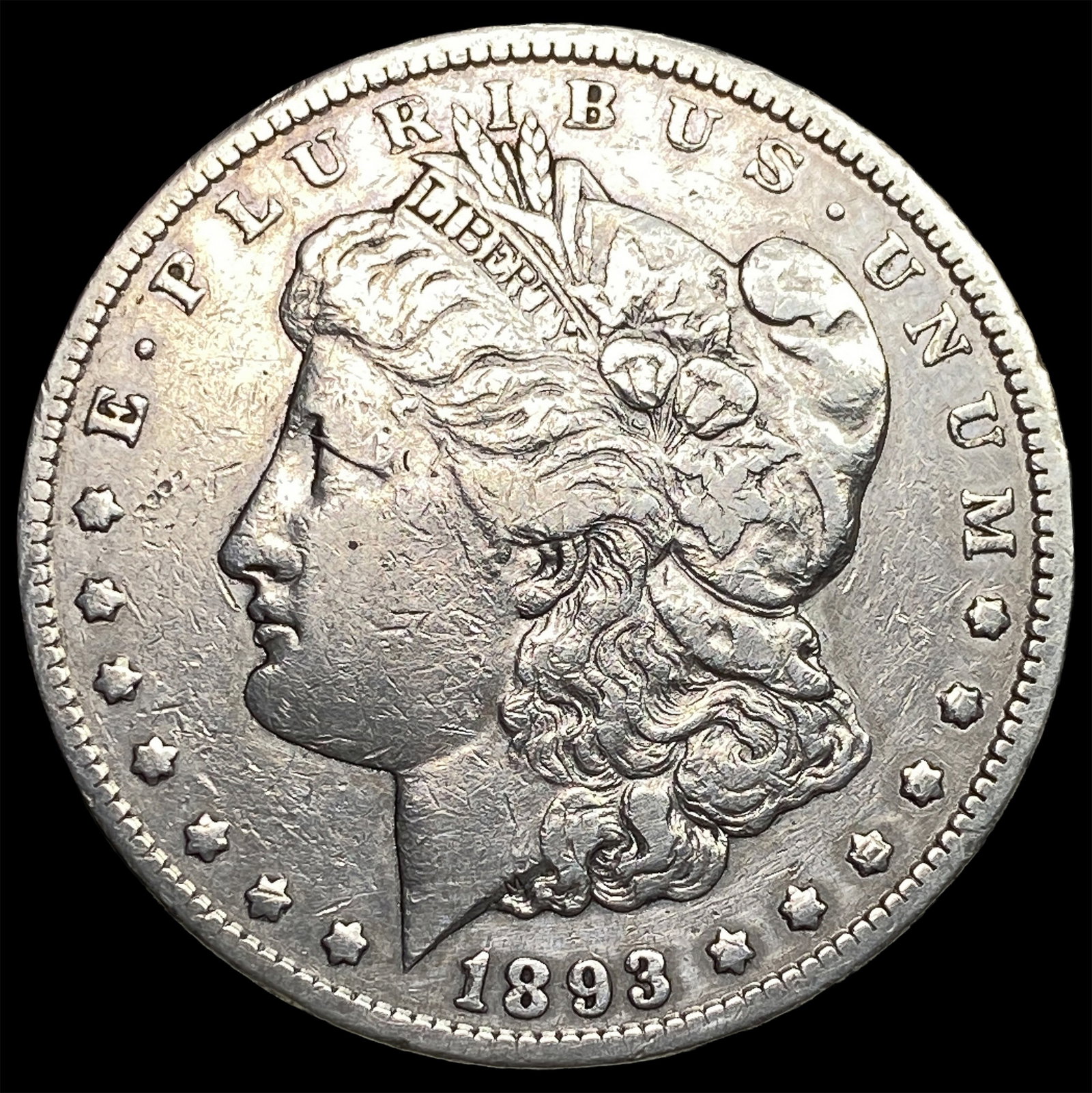 1893-CC Silver Morgan Dollar ABOUT UNCIRCULATED: 1893-CC Silver Morgan Dollar ABOUT UNCIRCULATED