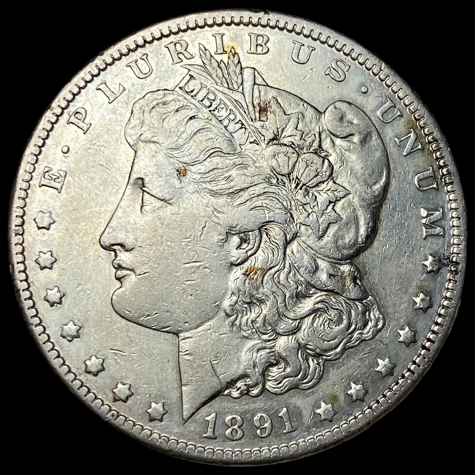1891-CC Silver Morgan Dollar NEARLY UNCIRCULATED (1 of 2)