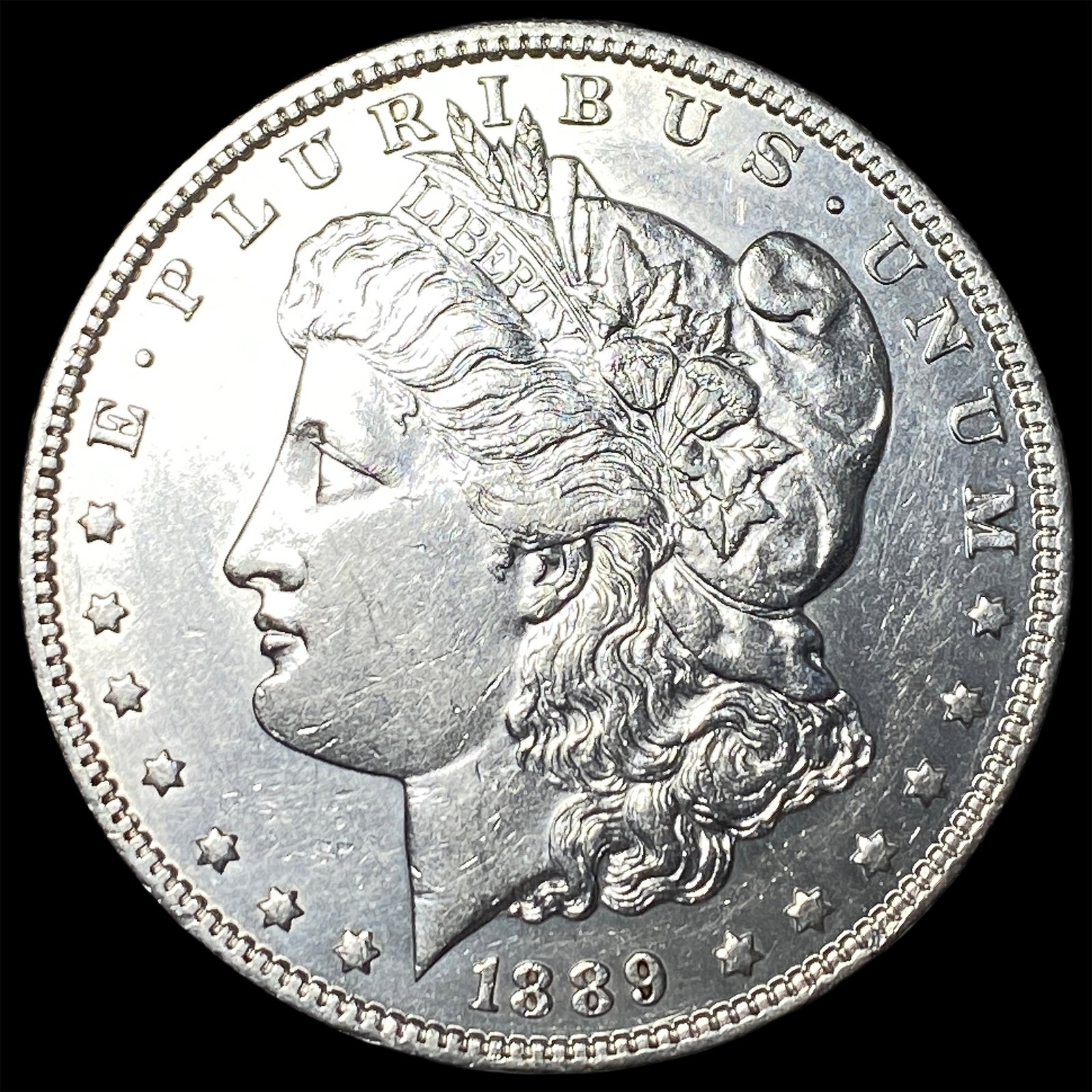 1889-O Silver Morgan Dollar CLOSELY UNCIRCULATED (1 of 2)