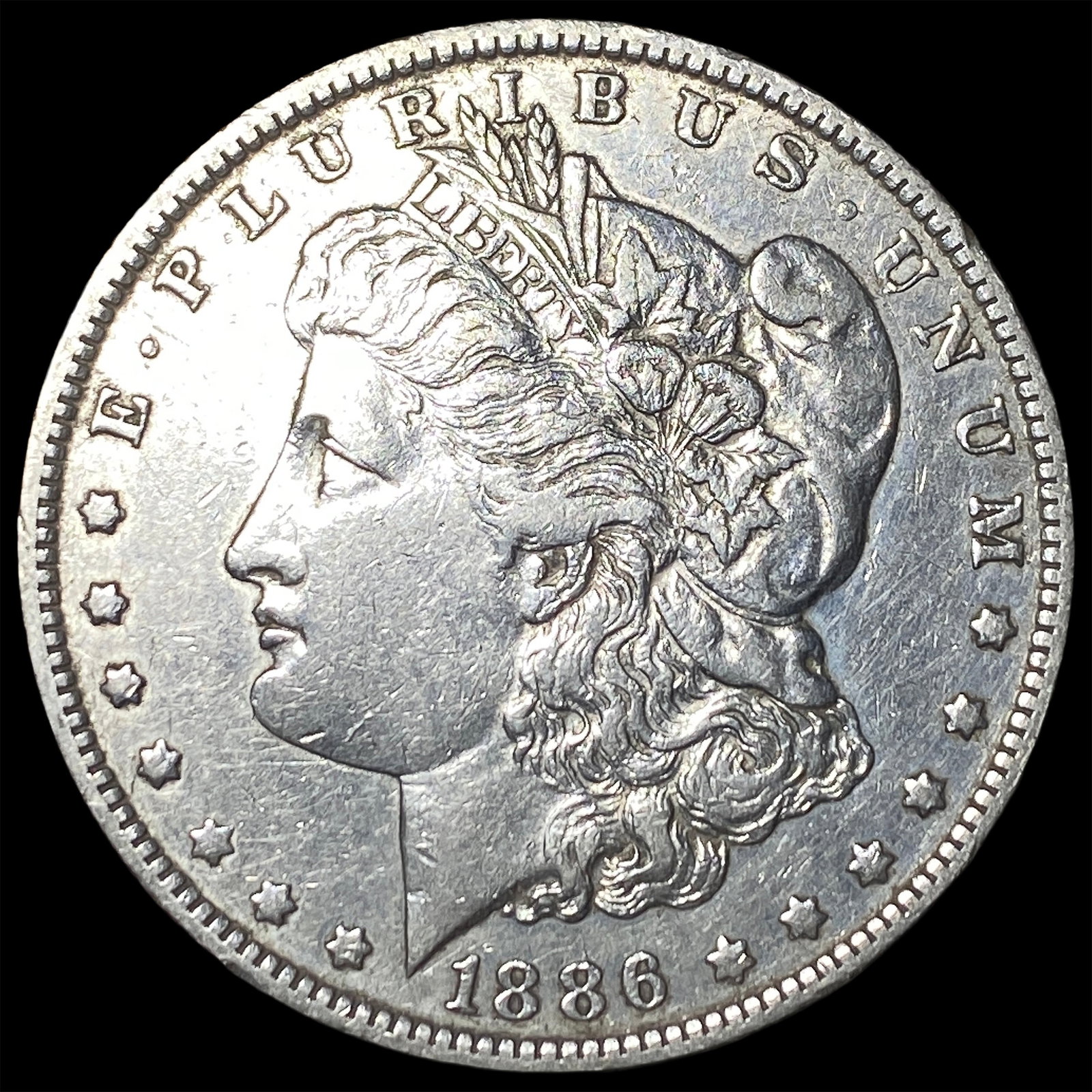 1886-O Silver Morgan Dollar NEARLY UNCIRCULATED: 1886-O Silver Morgan Dollar NEARLY UNCIRCULATED
