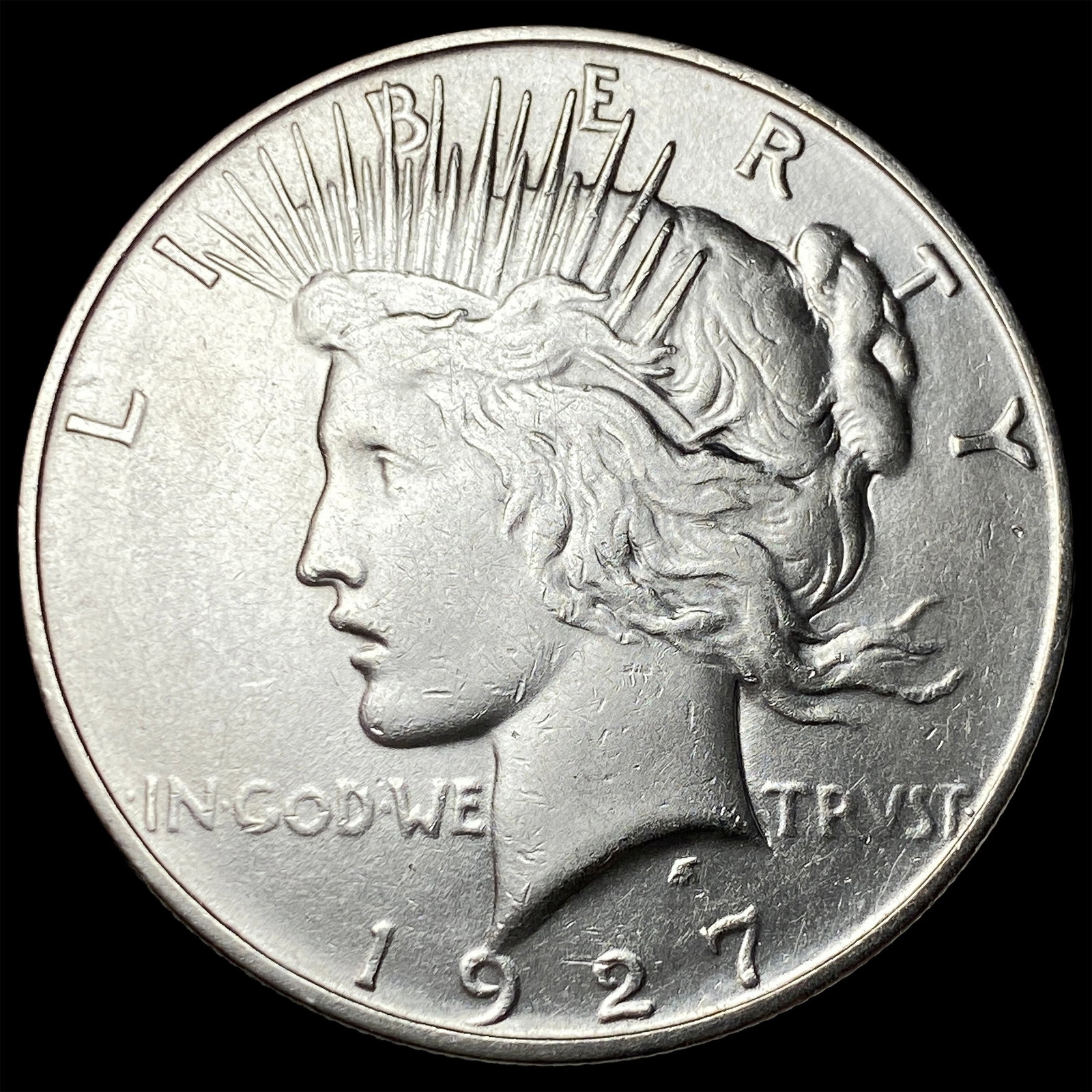 1927-D Peace Silver Dollar CLOSELY UNCIRCULATED: 1927-D Peace Silver Dollar CLOSELY UNCIRCULATED