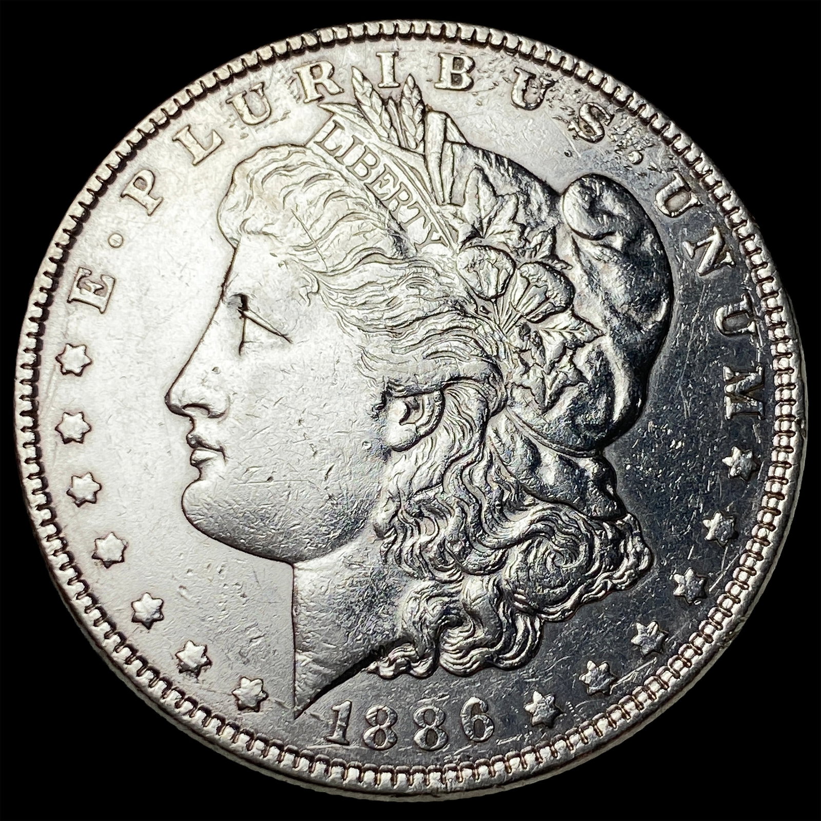 1886 Morgan Silver Dollar CLOSELY UNCIRCULATED: 1886 Morgan Silver Dollar CLOSELY UNCIRCULATED