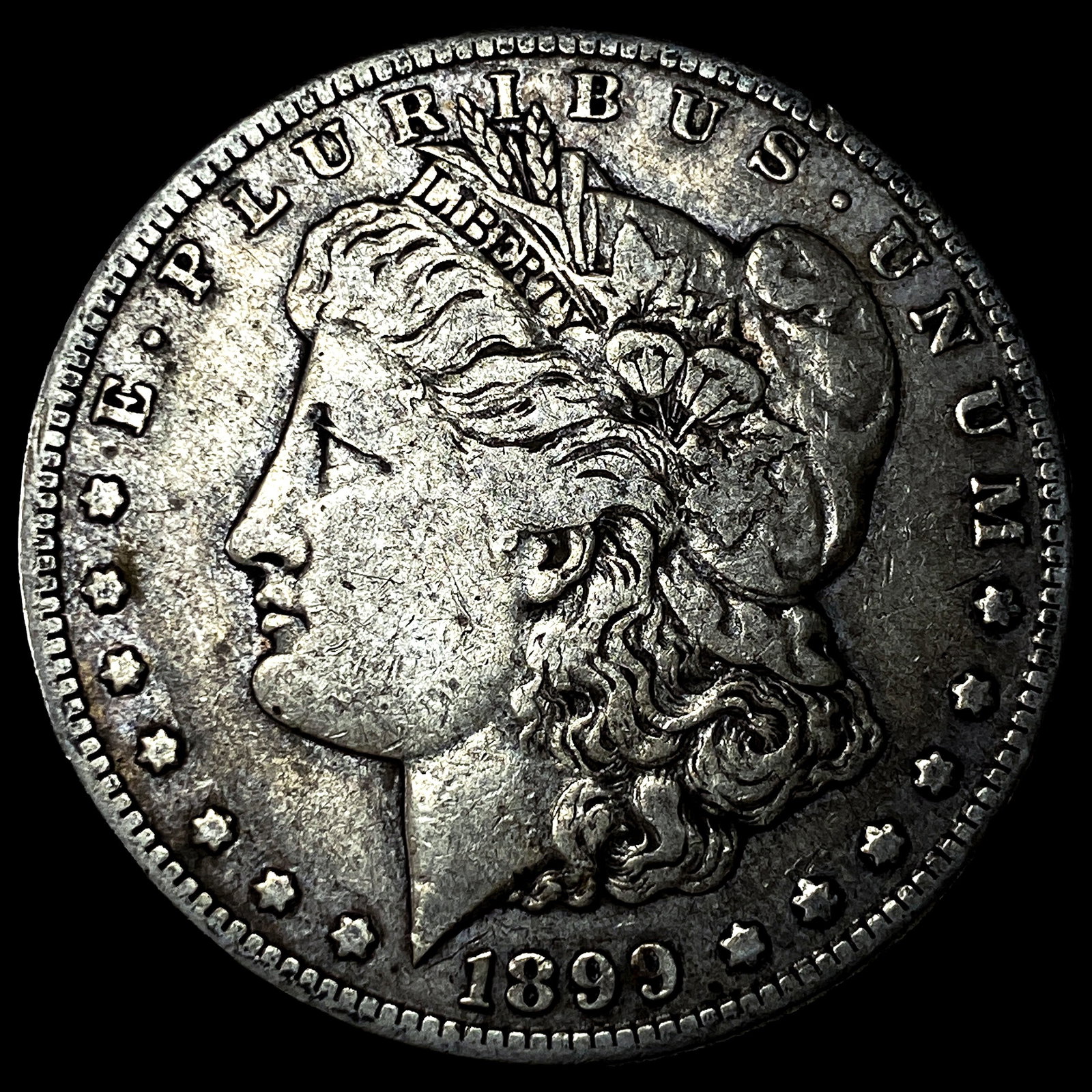 1899 Silver Morgan Dollar NEARLY UNCIRCULATED: 1899 Silver Morgan Dollar NEARLY UNCIRCULATED