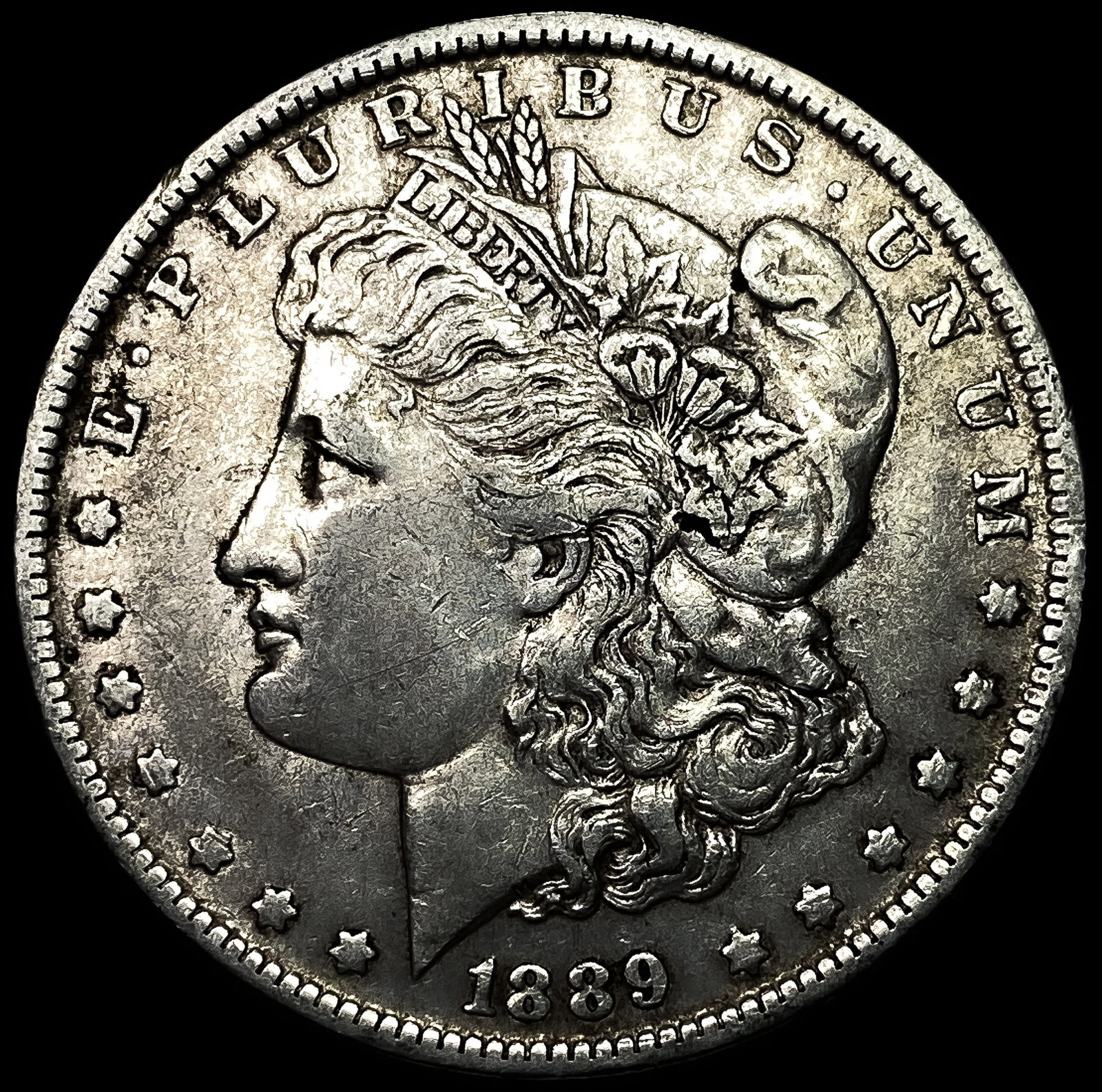 1889 Morgan Silver Dollar CLOSELY UNCIRCULATED (1 of 2)