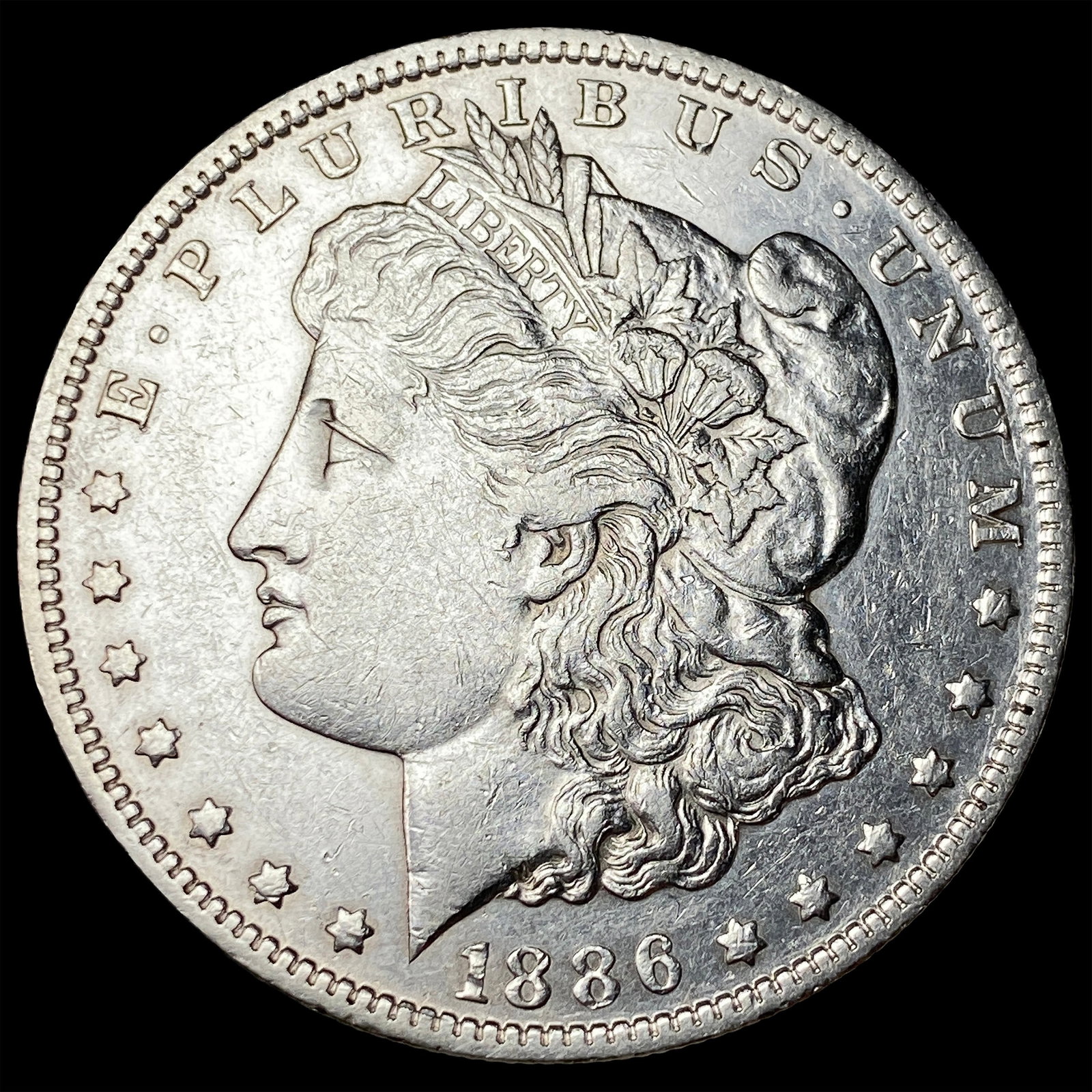 1886-O Silver Morgan Dollar CLOSELY UNCIRCULATED (1 of 2)