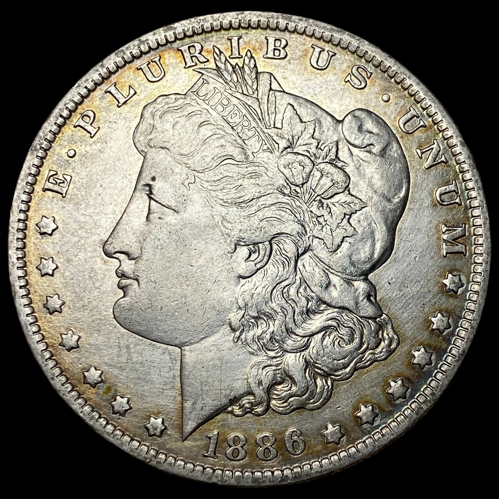1886-O Silver Morgan Dollar CLOSELY UNCIRCULATED (1 of 2)