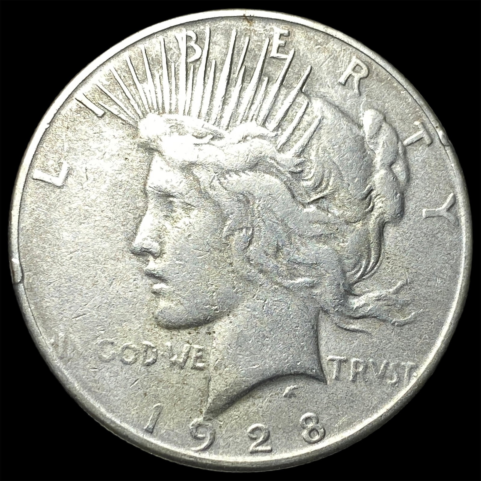 1928 Peace Silver Dollar NEARLY UNCIRCULATED (1 of 2)