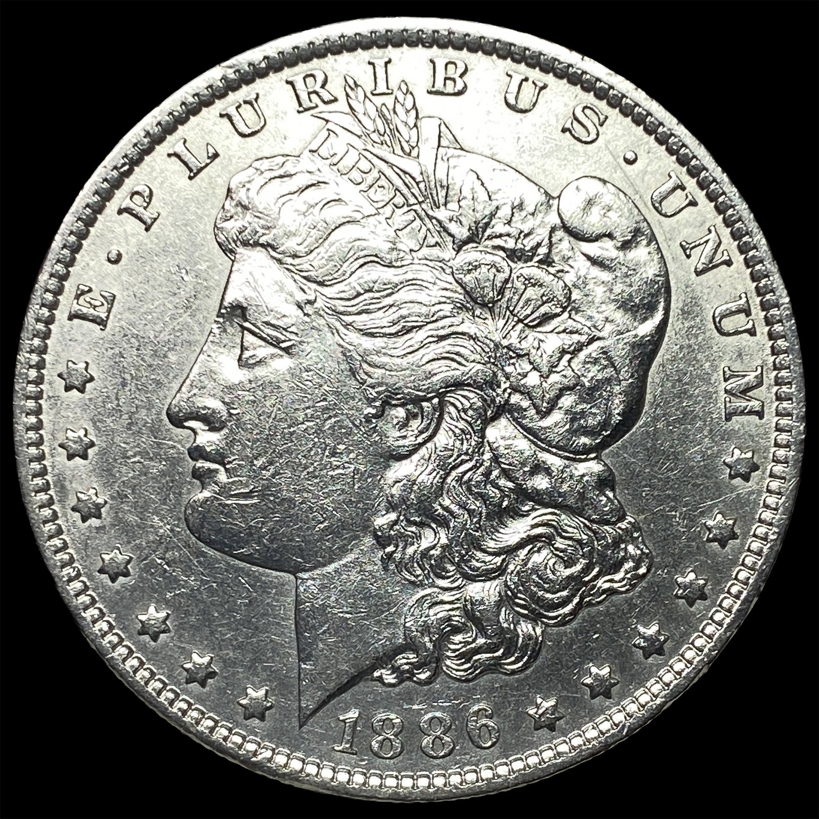 1886-O Silver Morgan Dollar CLOSELY UNCIRCULATED: 1886-O Silver Morgan Dollar CLOSELY UNCIRCULATED