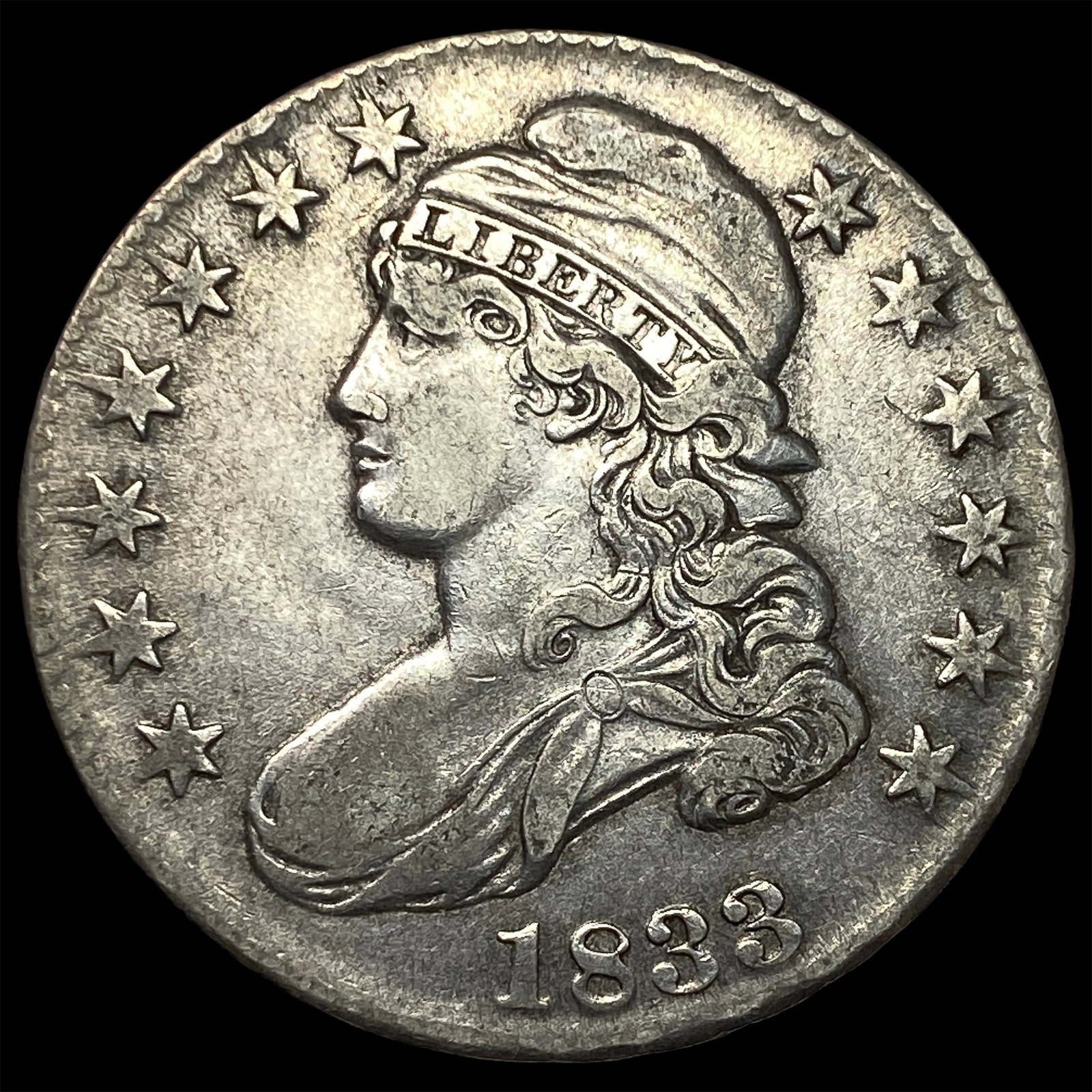 1833 Capped Bust Half Dollar NEARLY UNCIRCULATED (1 of 2)