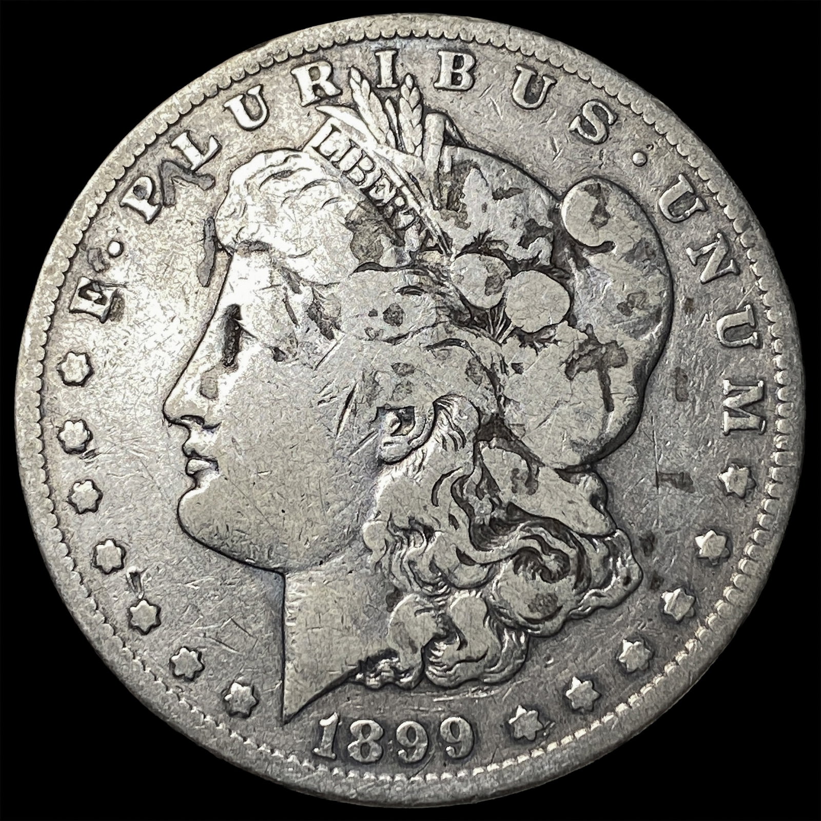 1899-S Silver Morgan Dollar ABOUT UNCIRCULATED (1 of 2)