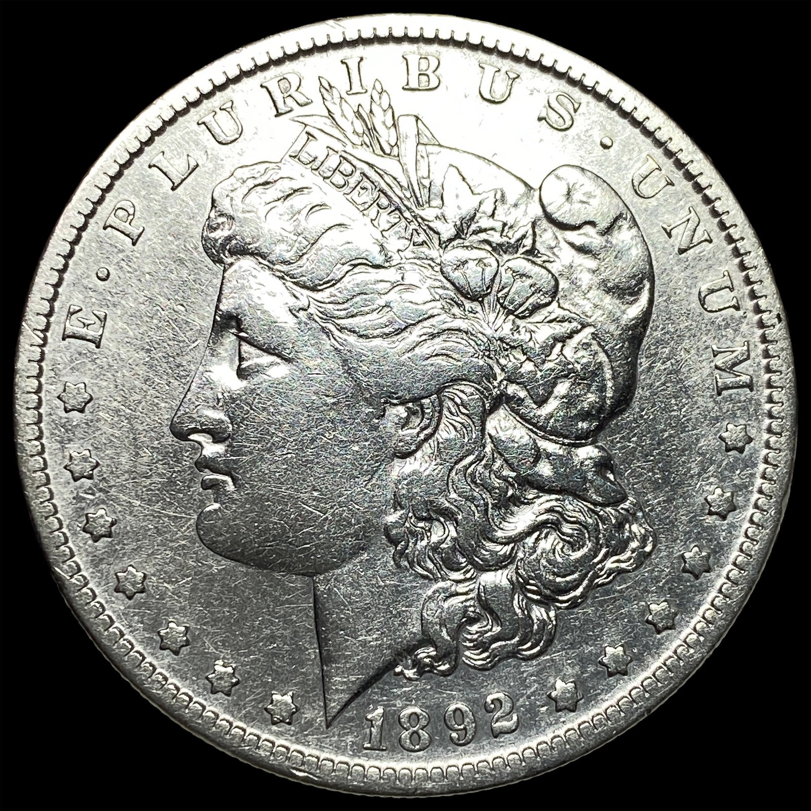 1892-S Silver Morgan Dollar NEARLY UNCIRCULATED (1 of 2)