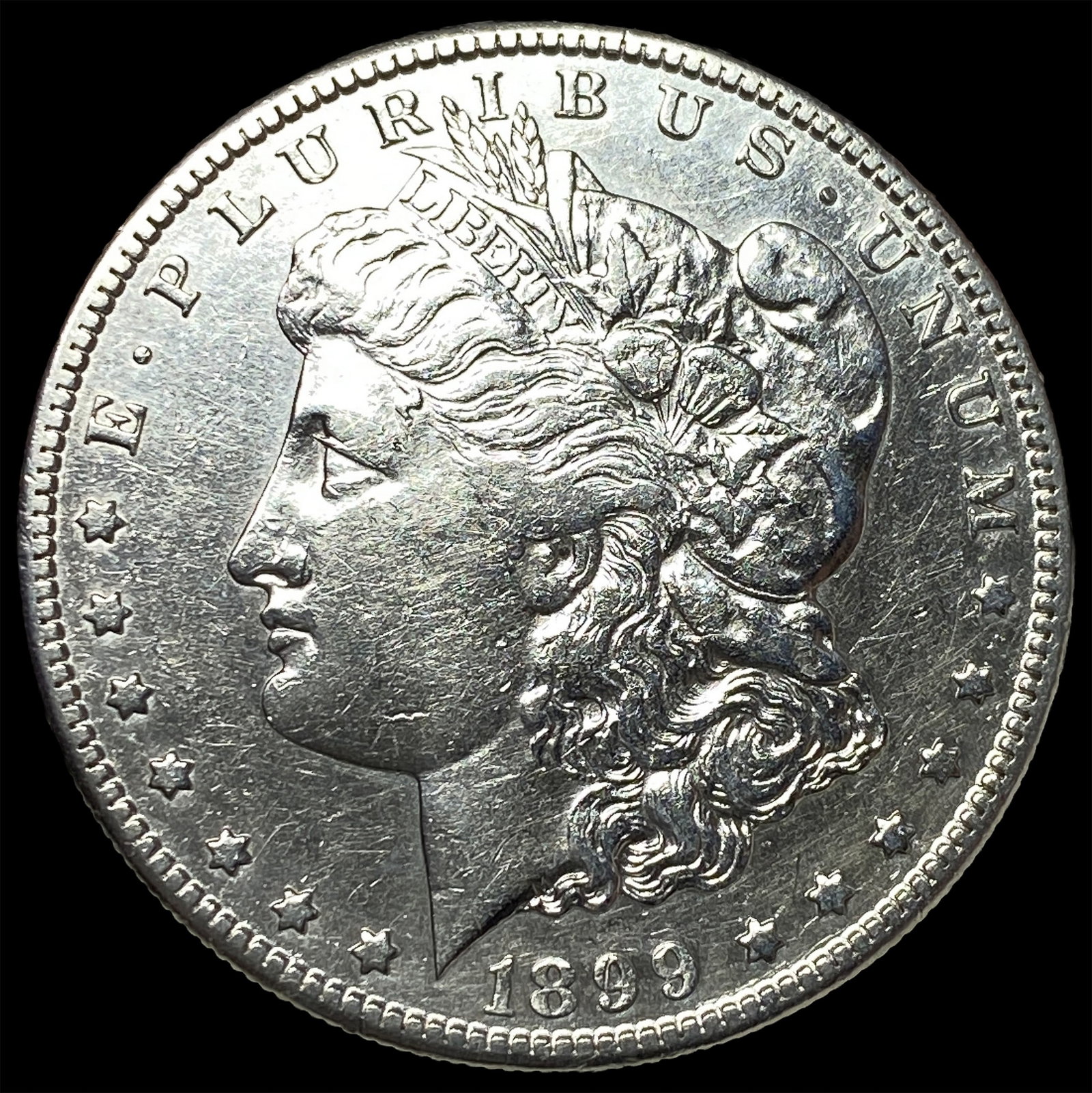 1899-S Silver Morgan Dollar ABOUT UNCIRCULATED: 1899-S Silver Morgan Dollar ABOUT UNCIRCULATED