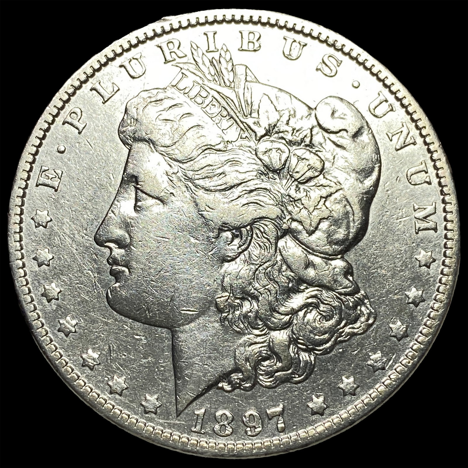1897-O Morgan Silver Dollar ABOUT UNCIRCULATED: 1897-O Morgan Silver Dollar ABOUT UNCIRCULATED