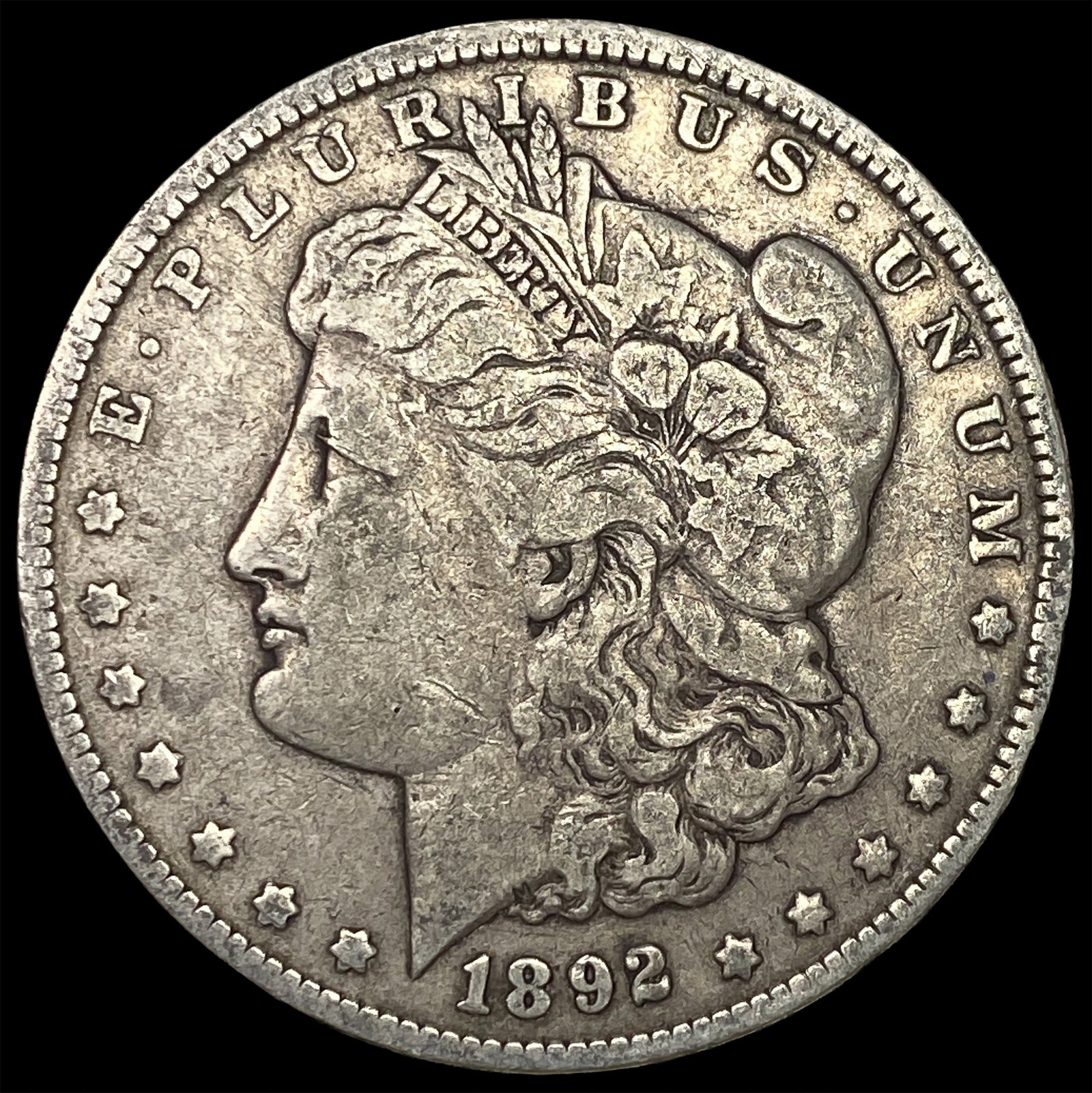 1892-S Silver Morgan Dollar ABOUT UNCIRCULATED: 1892-S Silver Morgan Dollar ABOUT UNCIRCULATED