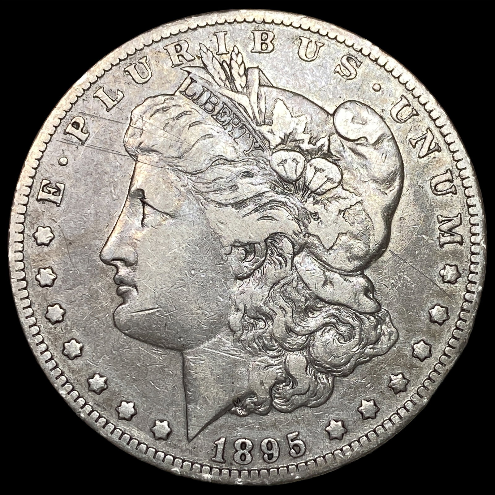 1895-O Silver Morgan Dollar ABOUT UNCIRCULATED: 1895-O Silver Morgan Dollar ABOUT UNCIRCULATED