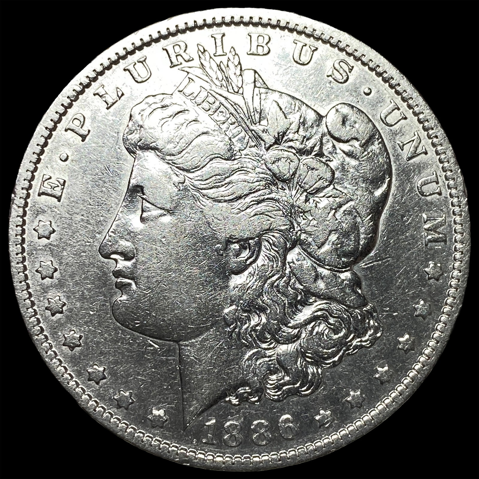 1886-O Silver Morgan Dollar CLOSELY UNCIRCULATED: 1886-O Silver Morgan Dollar CLOSELY UNCIRCULATED