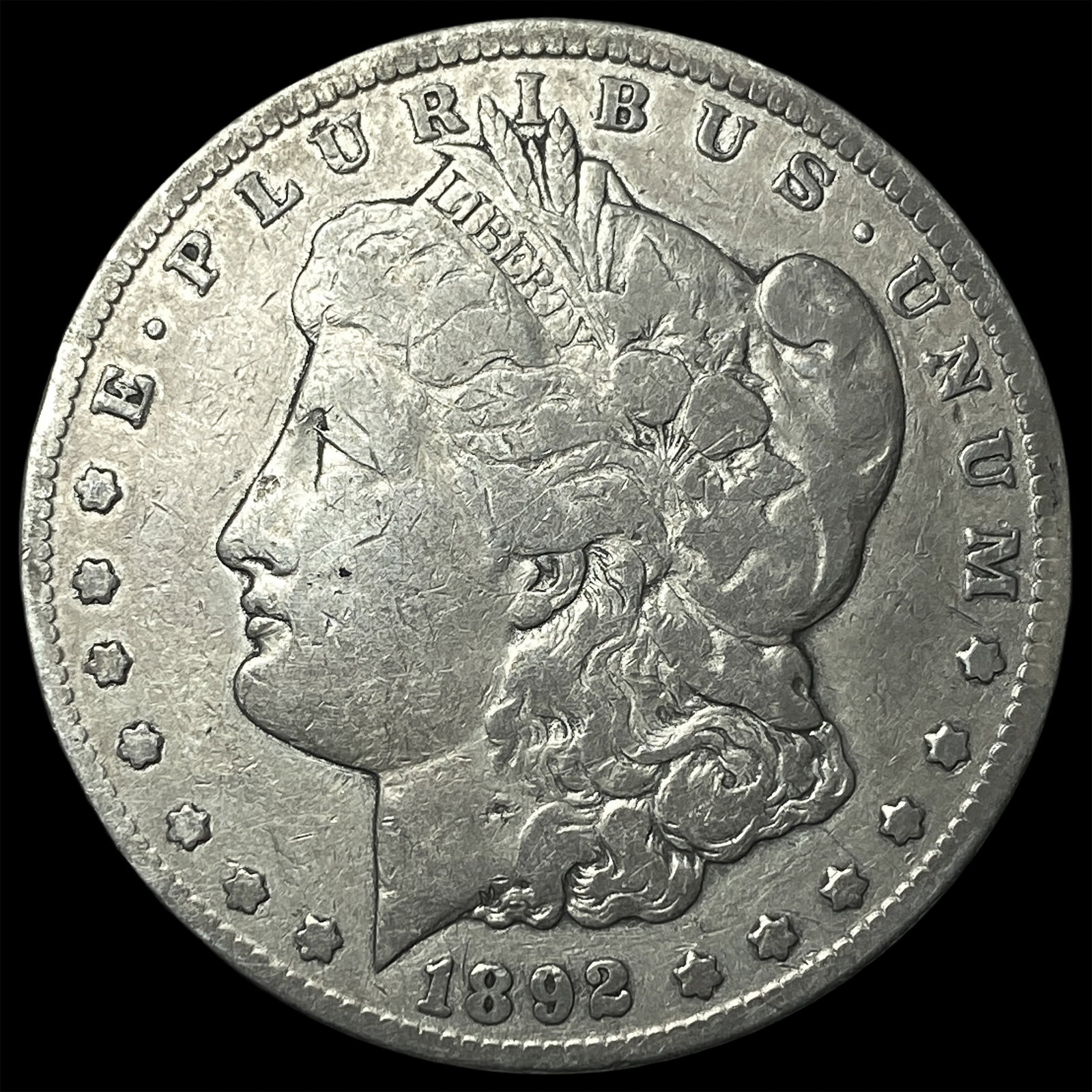1892-CC Silver Morgan Dollar ABOUT UNCIRCULATED: 1892-CC Silver Morgan Dollar ABOUT UNCIRCULATED