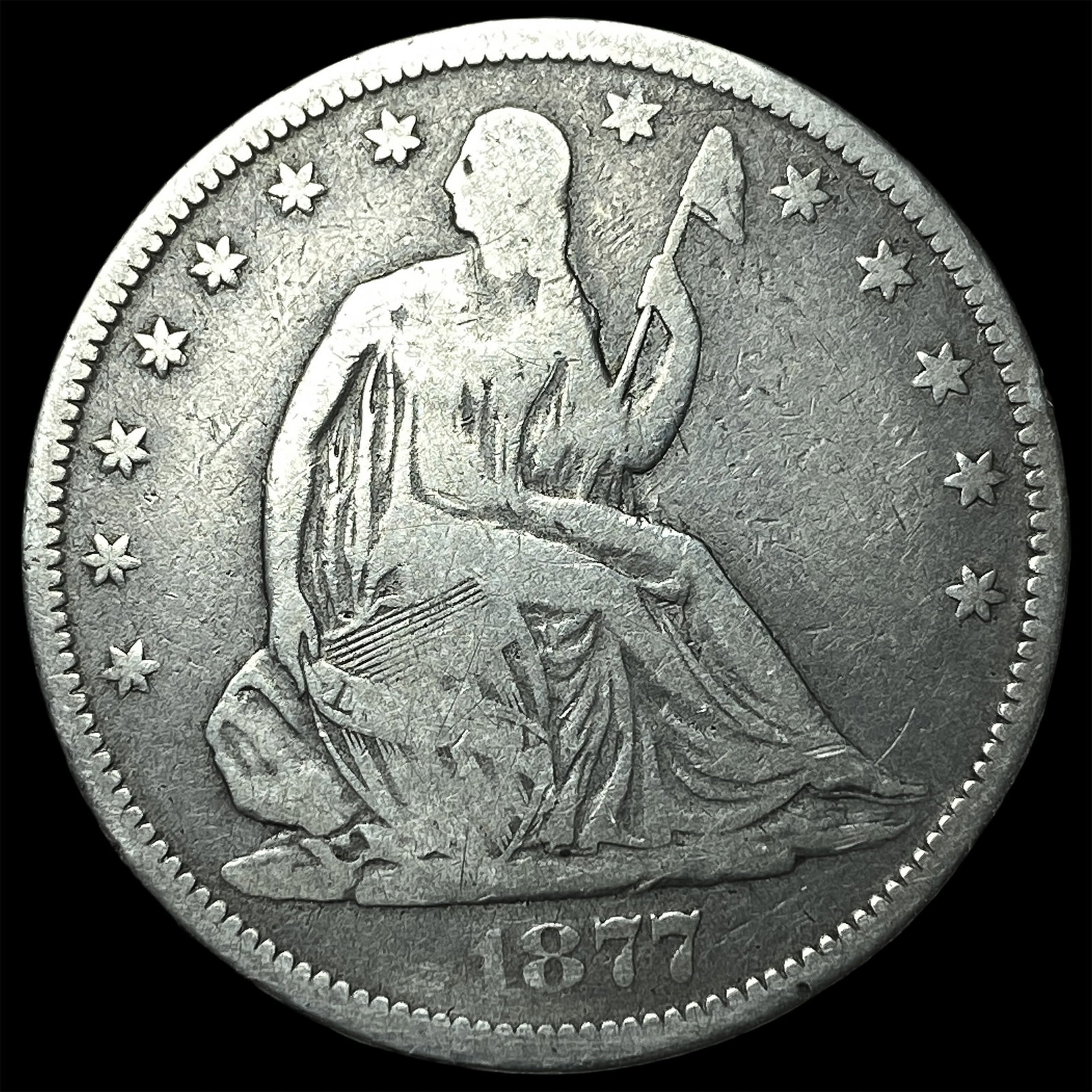 1877-CC Silver Half Dollar ABOUT UNCIRCULATED: 1877-CC Silver Half Dollar ABOUT UNCIRCULATED