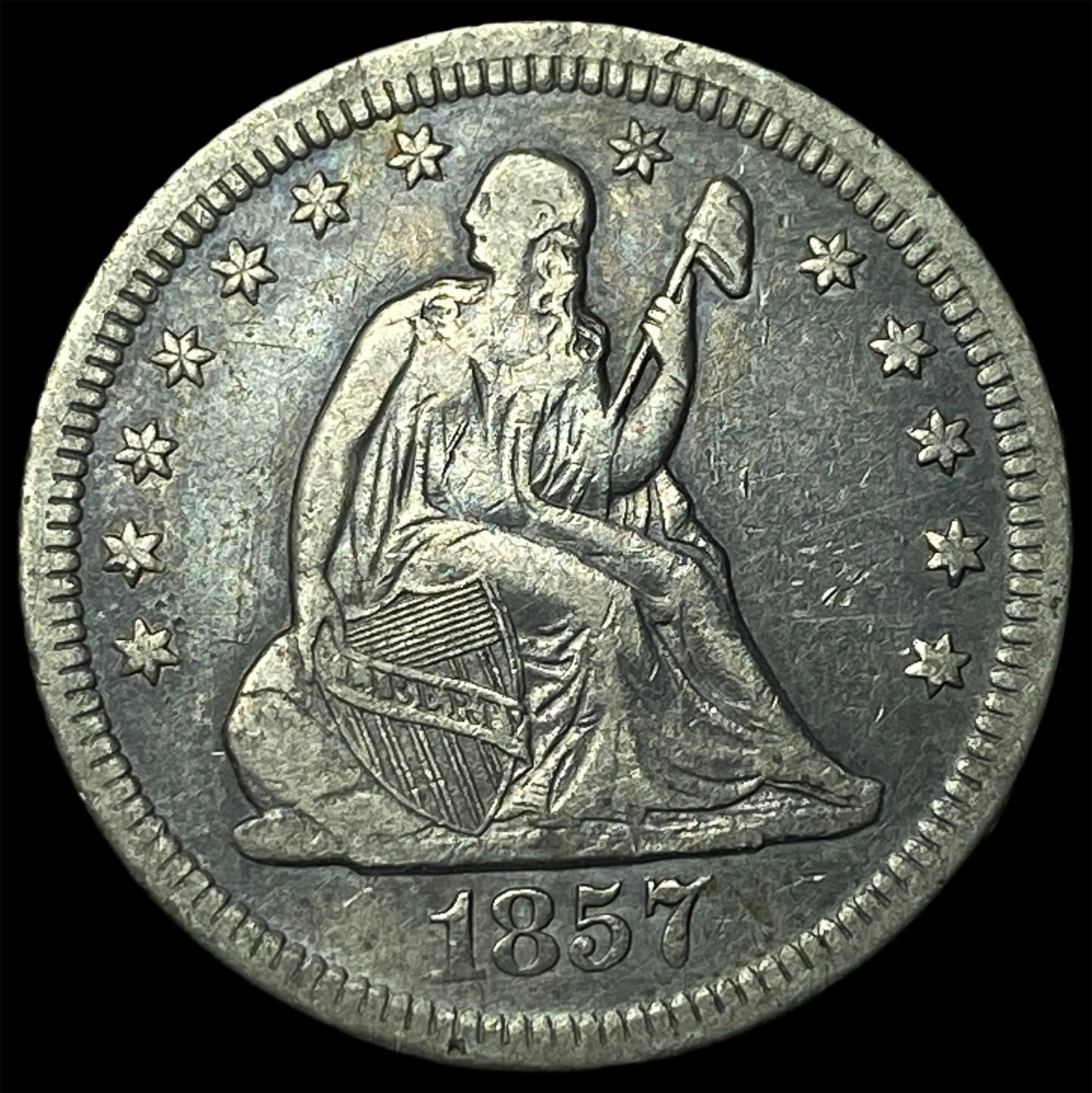 1857-O Silver Seated Liberty Quarter ABOUT UNCIRCULATED (1 of 2)