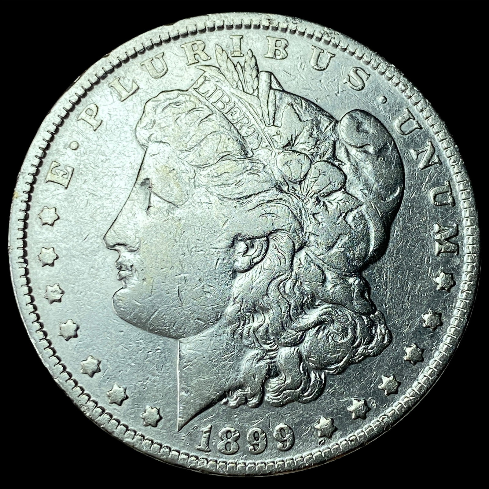 1899-O Silver Morgan Dollar CLOSELY UNCIRCULATED: 1899-O Silver Morgan Dollar CLOSELY UNCIRCULATED