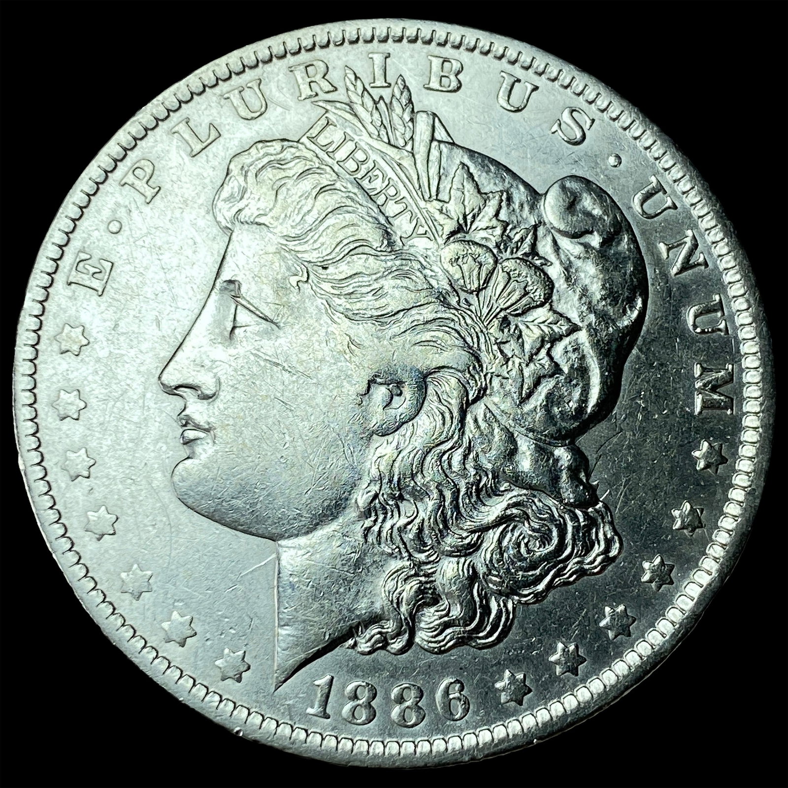 1886-O Silver Morgan Dollar CLOSELY UNCIRCULATED: 1886-O Silver Morgan Dollar CLOSELY UNCIRCULATED