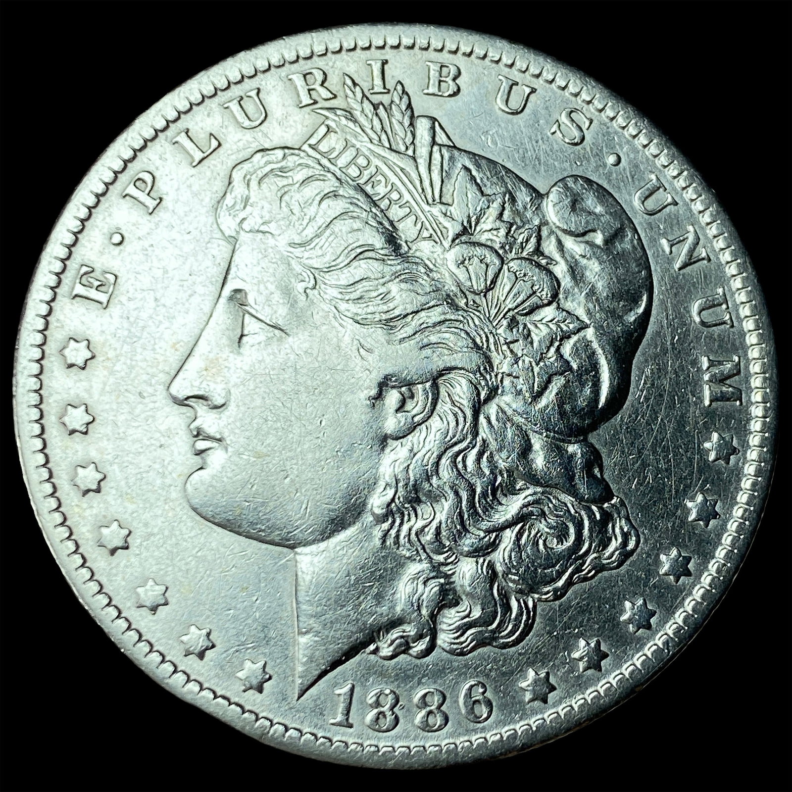 1886-O Silver Morgan Dollar CLOSELY UNCIRCULATED: 1886-O Silver Morgan Dollar CLOSELY UNCIRCULATED
