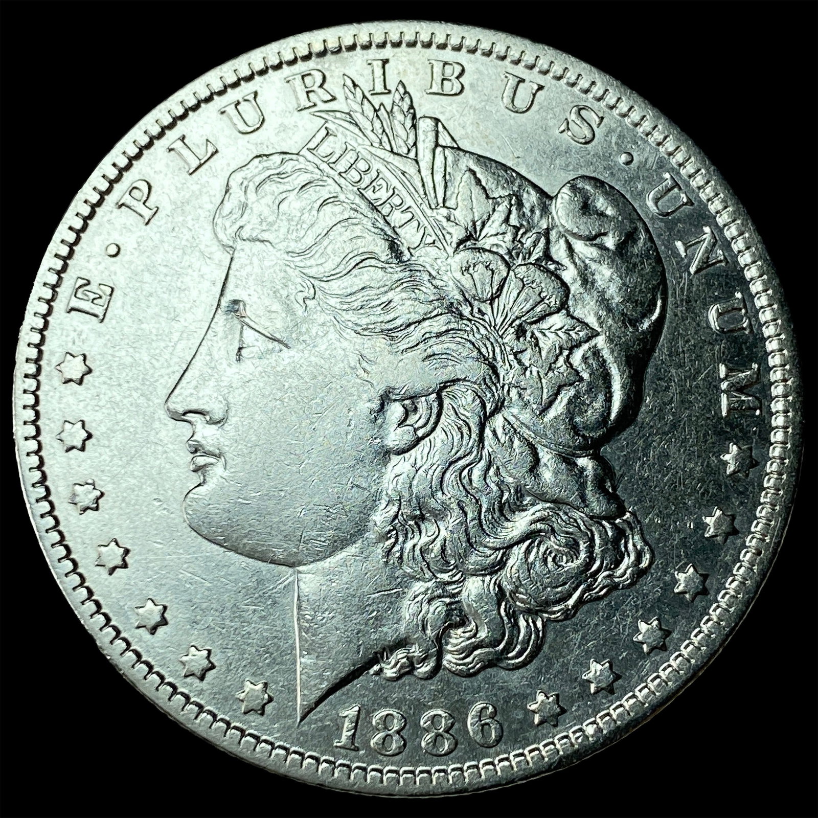 1886-O Silver Morgan Dollar CLOSELY UNCIRCULATED: 1886-O Silver Morgan Dollar CLOSELY UNCIRCULATED