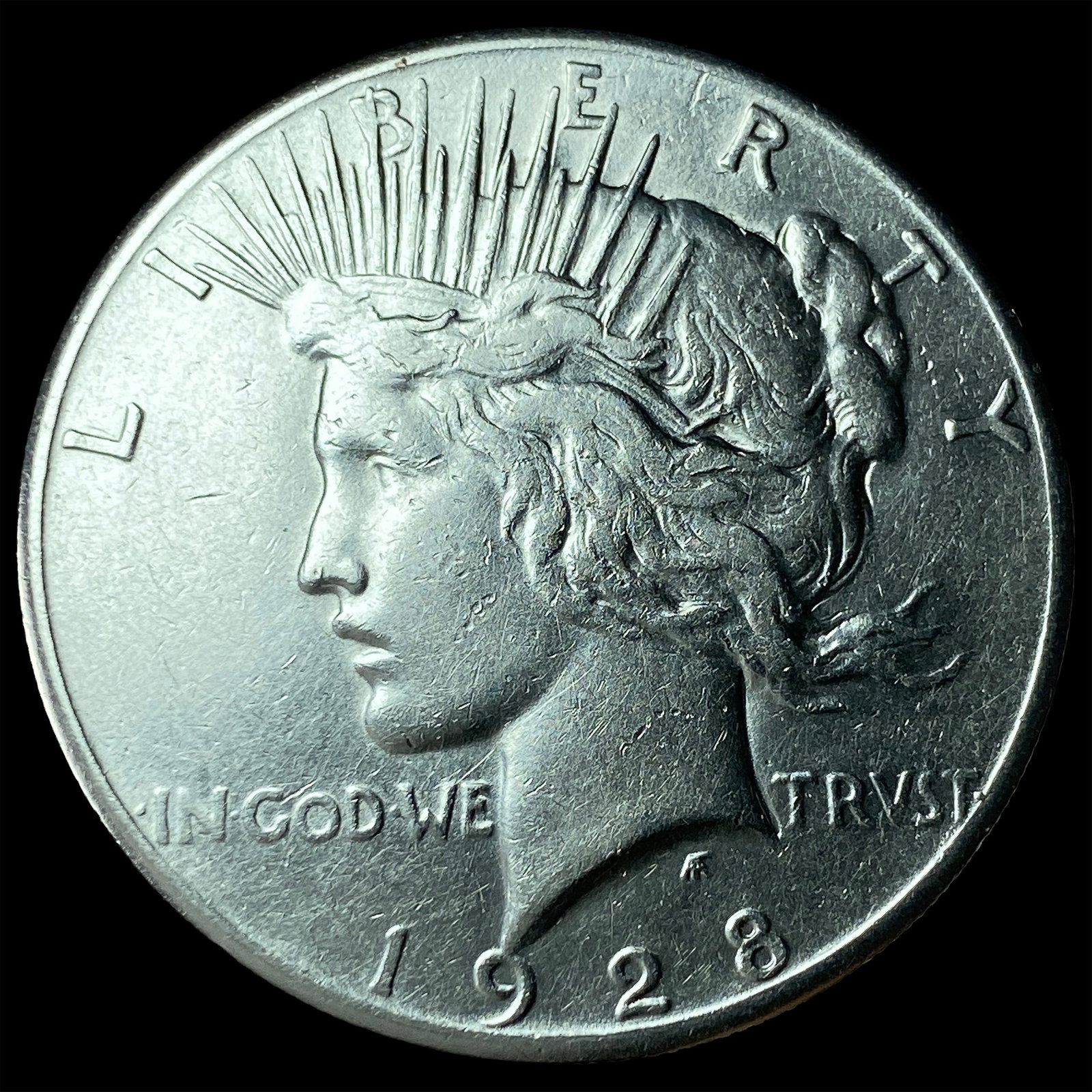 1928 Silver Peace Dollar CLOSELY UNCIRCULATED (1 of 2)