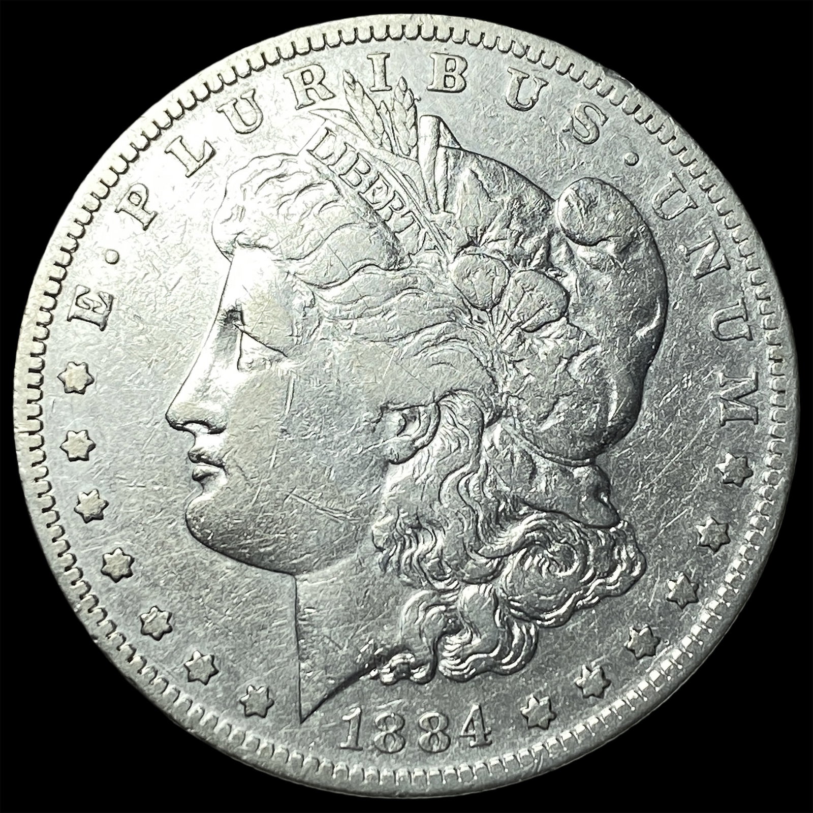 1884-S Silver Morgan Dollar ABOUT UNCIRCULATED: 1884-S Silver Morgan Dollar ABOUT UNCIRCULATED