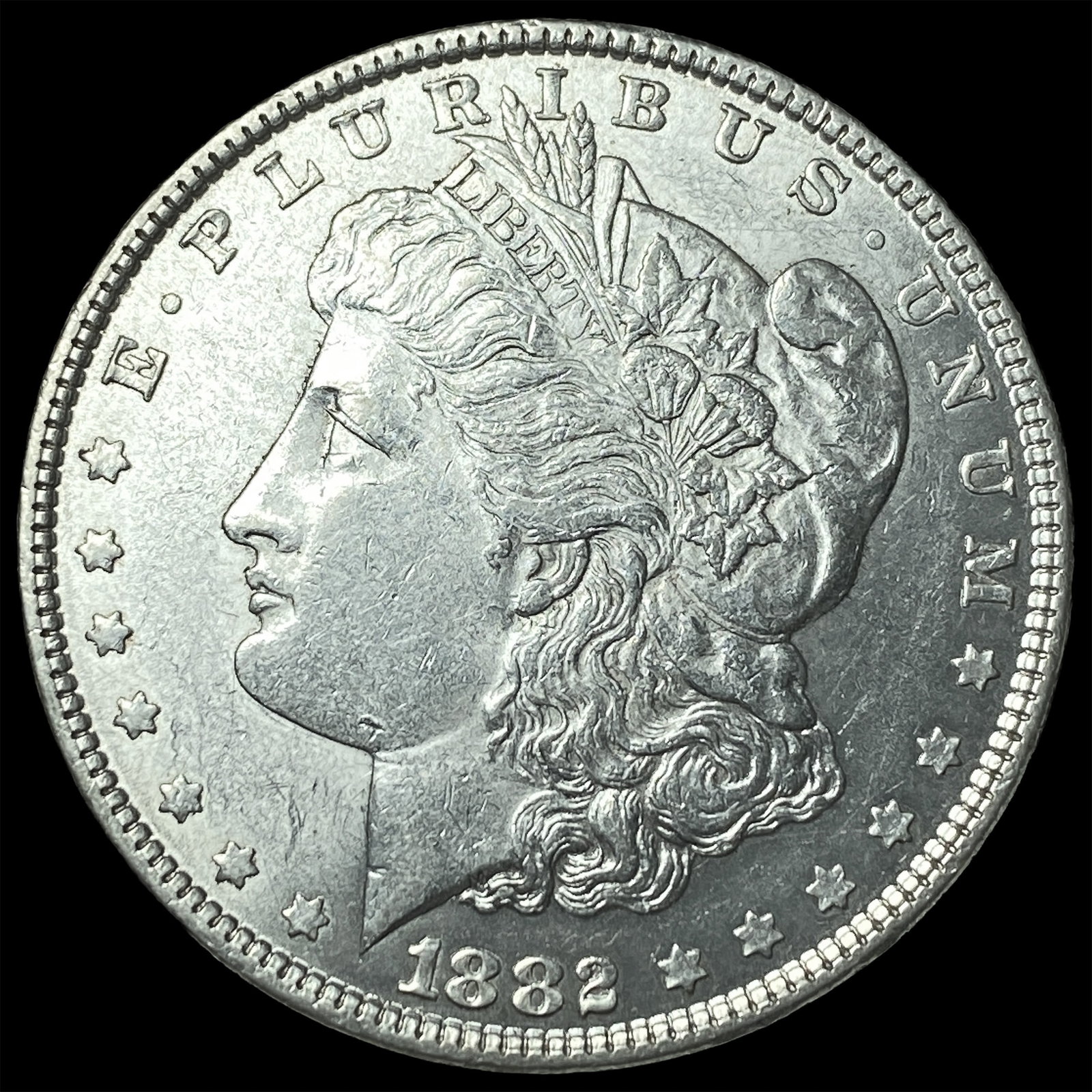 1882-S Silver Morgan Dollar ABOUT UNCIRCULATED: 1882-S Silver Morgan Dollar ABOUT UNCIRCULATED