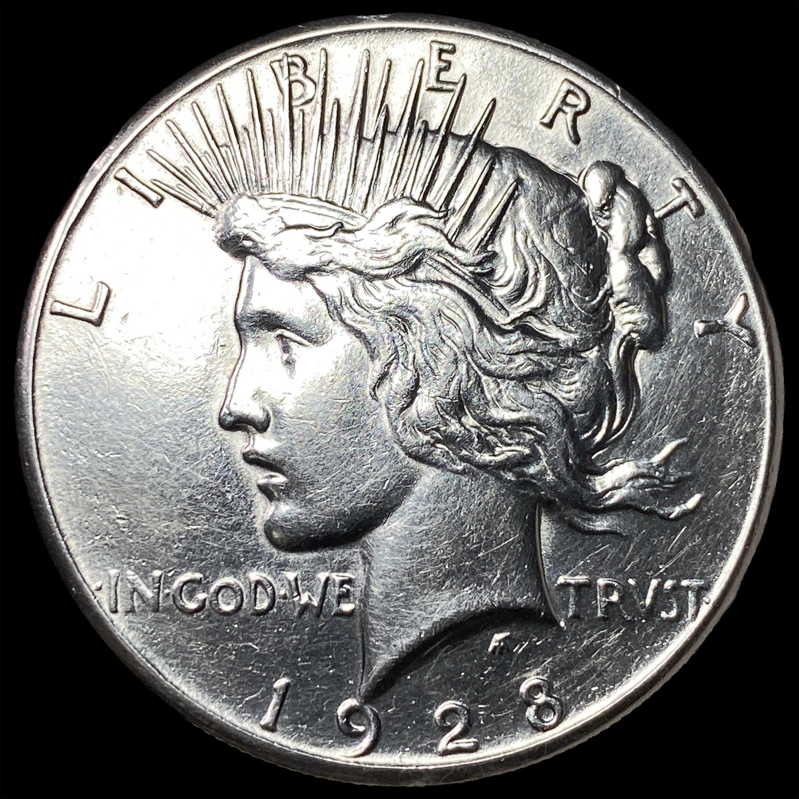1928 Silver Peace Dollar CLOSELY UNCIRCULATED (1 of 2)