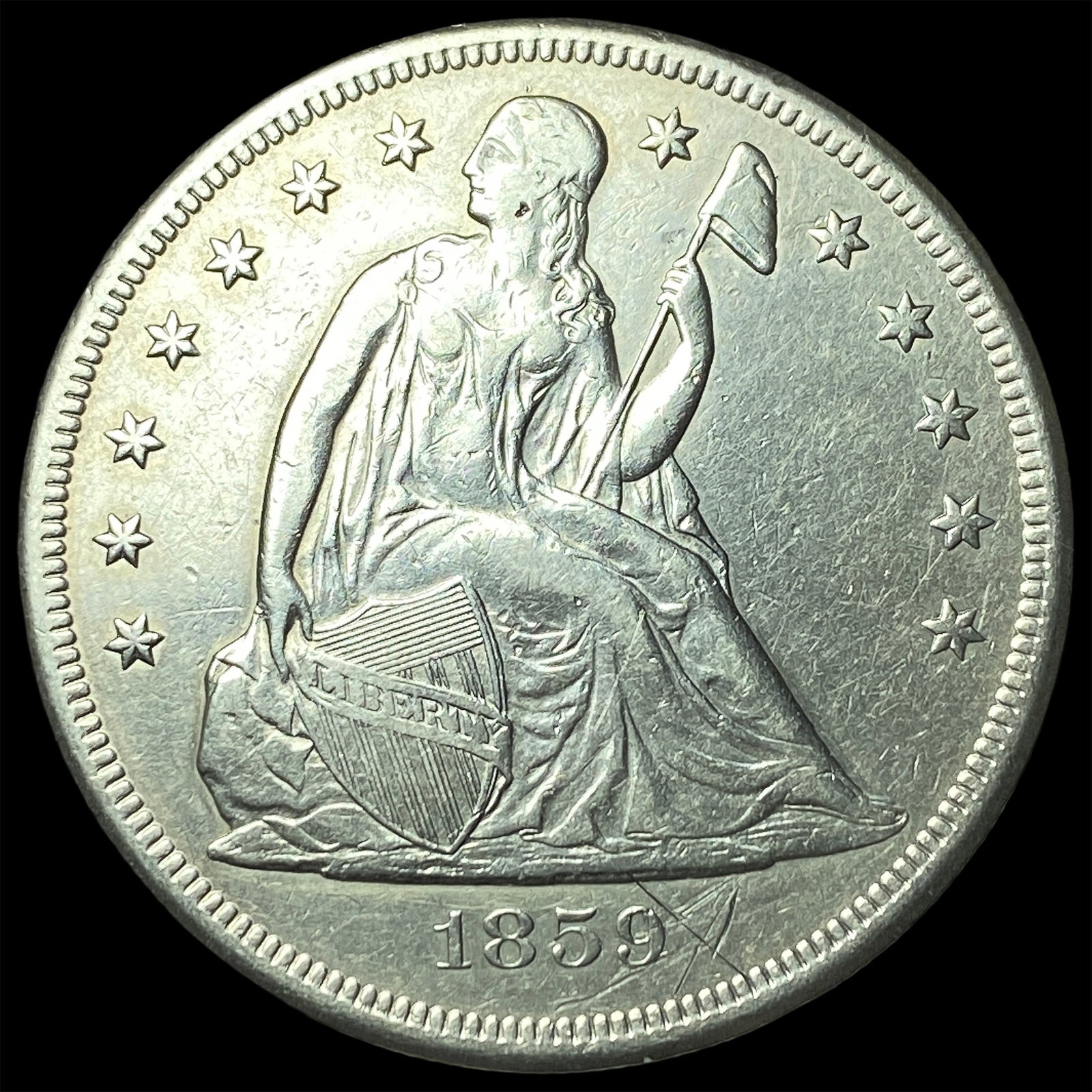 1859-O Silver Seated Liberty Dollar CLOSELY UNCIRCULATED (1 of 2)