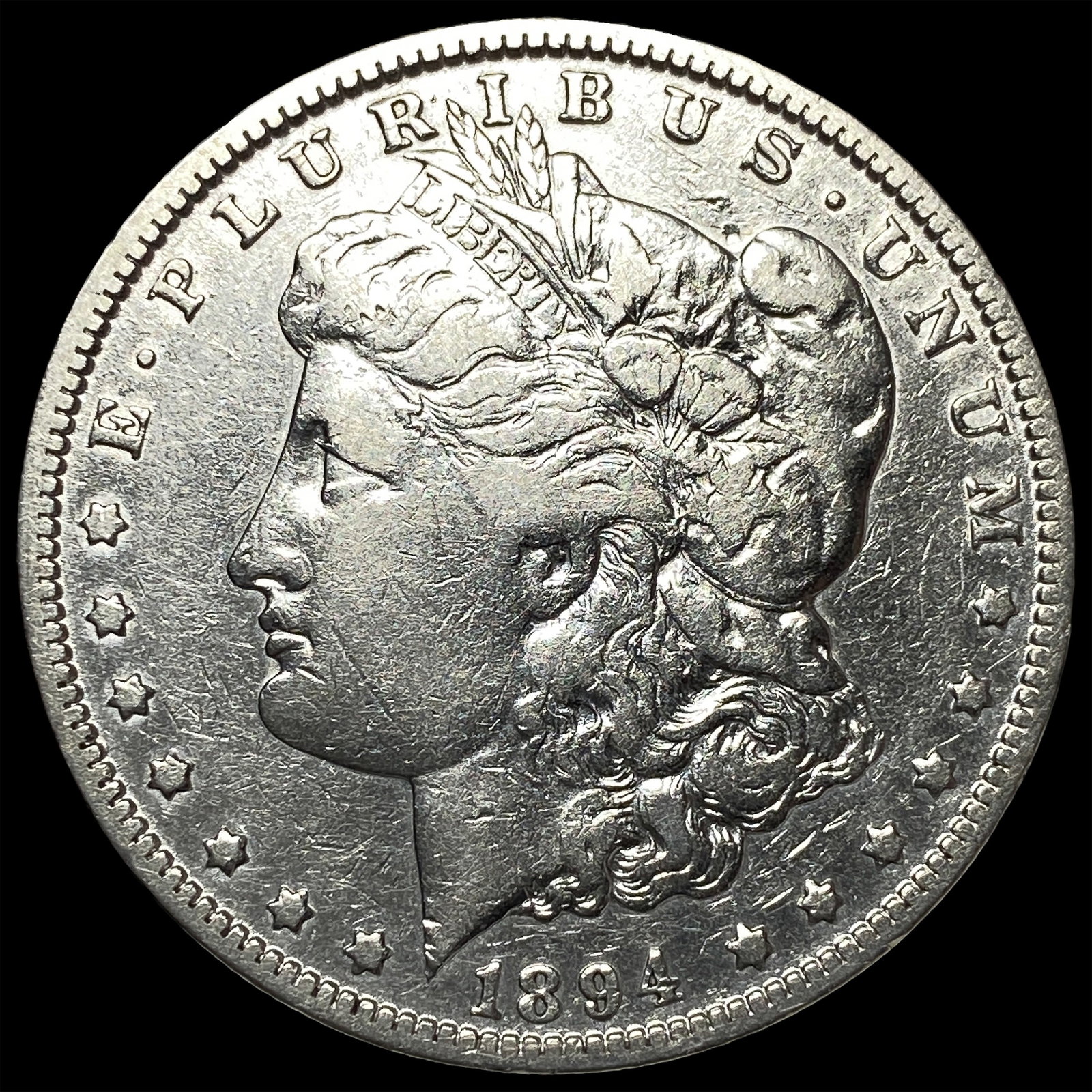 1894-O Silver Morgan Dollar ABOUT UNCIRCULATED: 1894-O Silver Morgan Dollar ABOUT UNCIRCULATED
