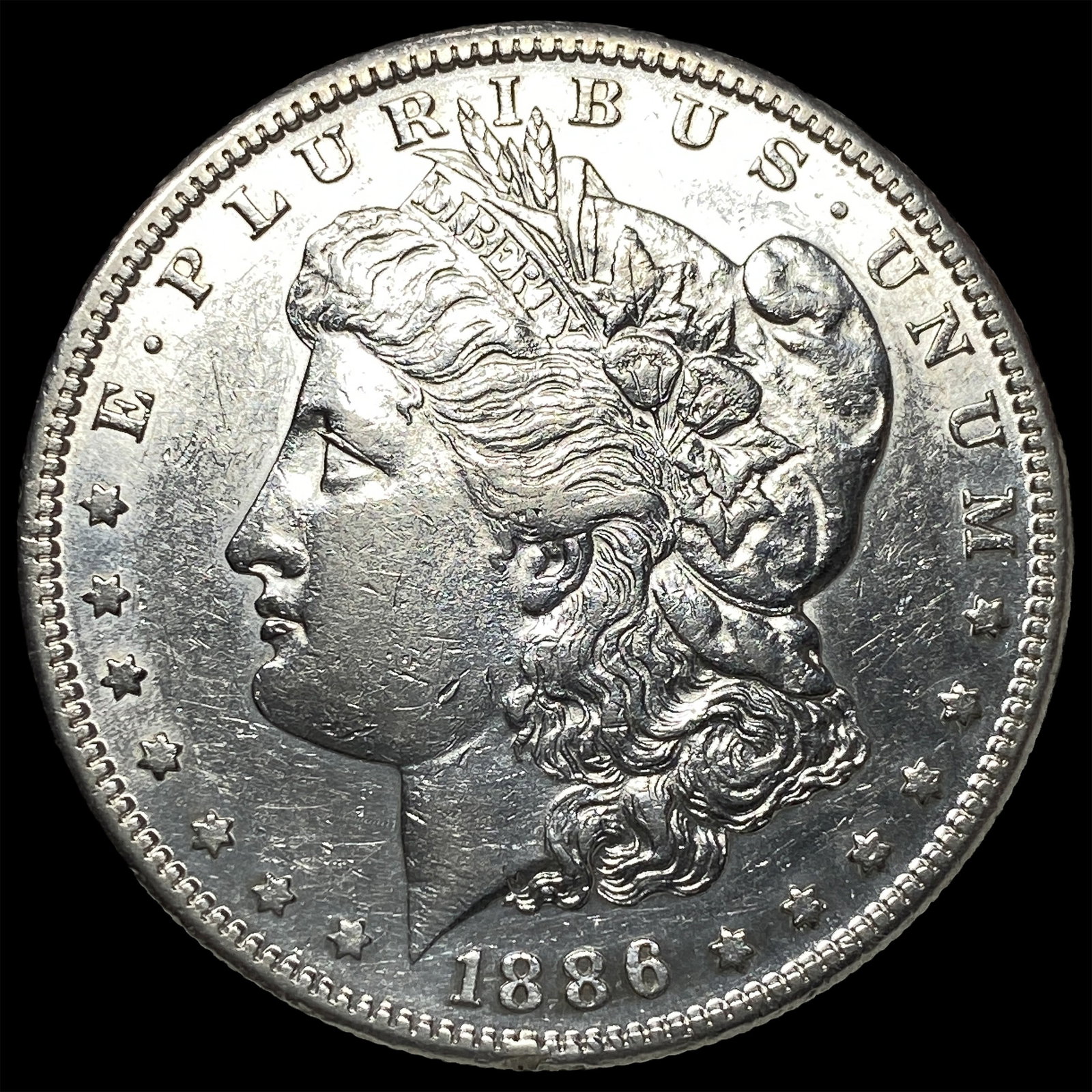 1886 Silver Morgan Dollar CLOSELY UNCIRCULATED: 1886 Silver Morgan Dollar CLOSELY UNCIRCULATED